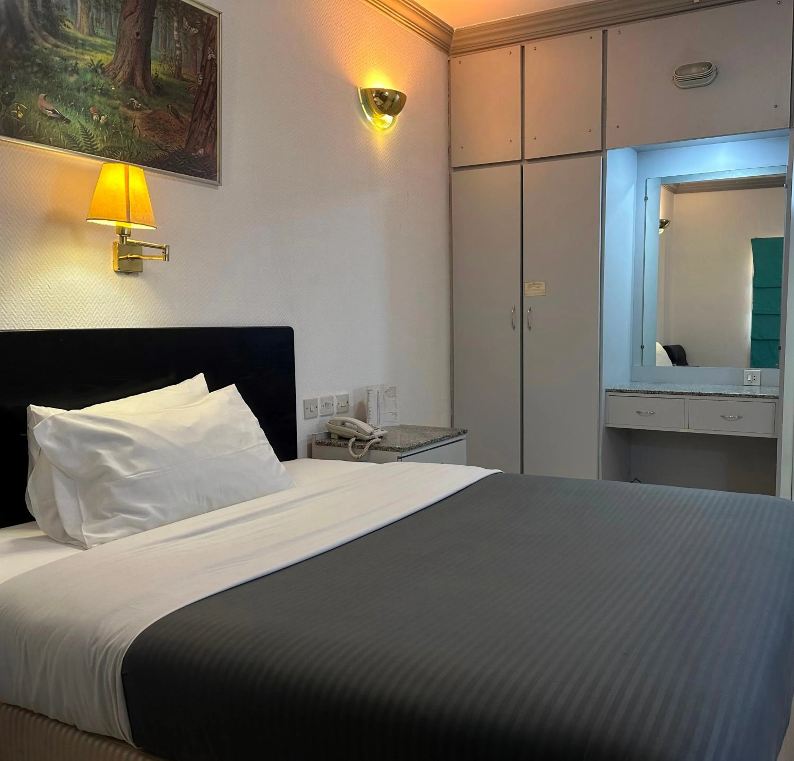 Bed in Grand Astoria Hotel