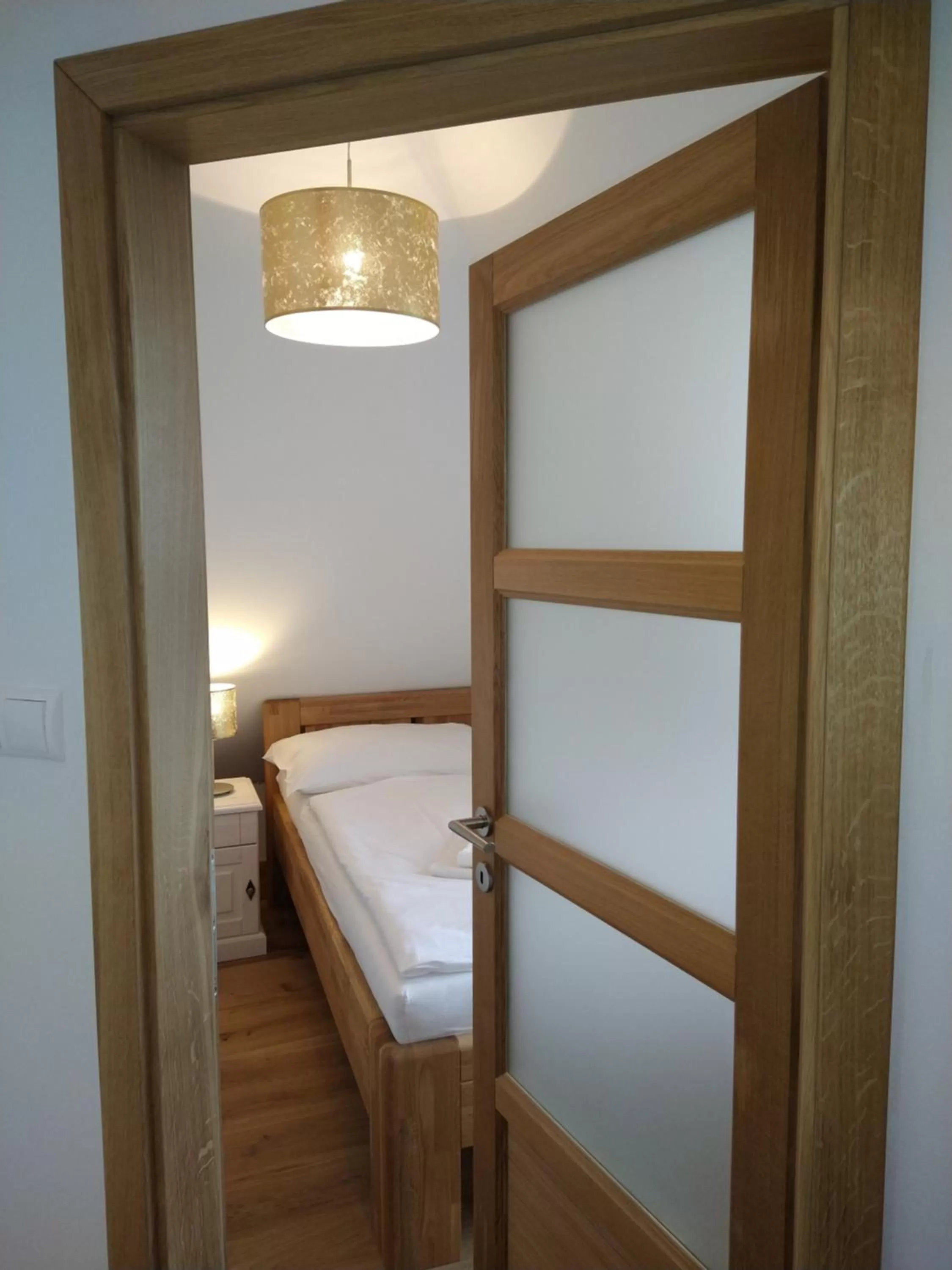 Bed in Apartmány Malý mnich