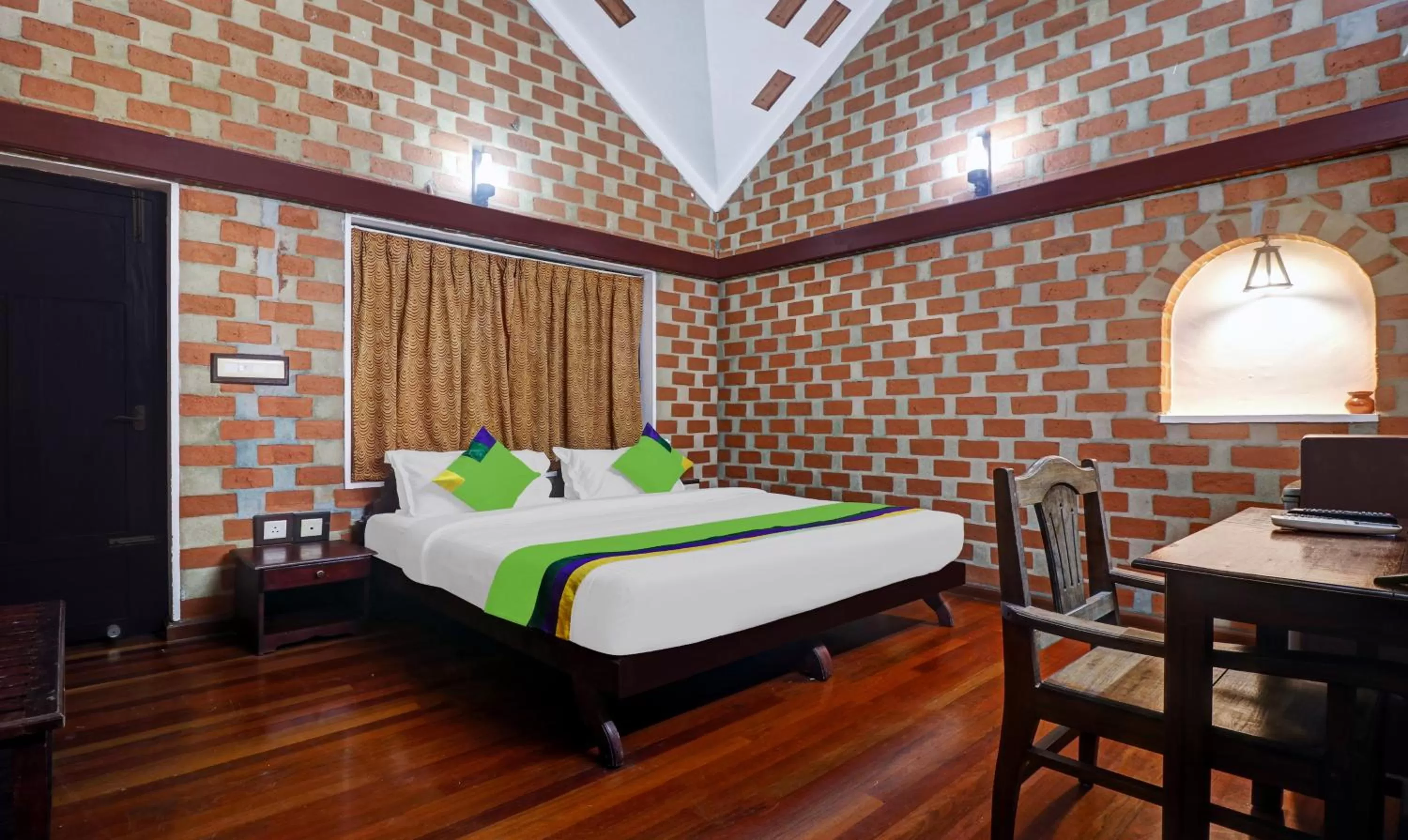 Bed in Treebo Trend God'S Own Country Ayurveda Resorts