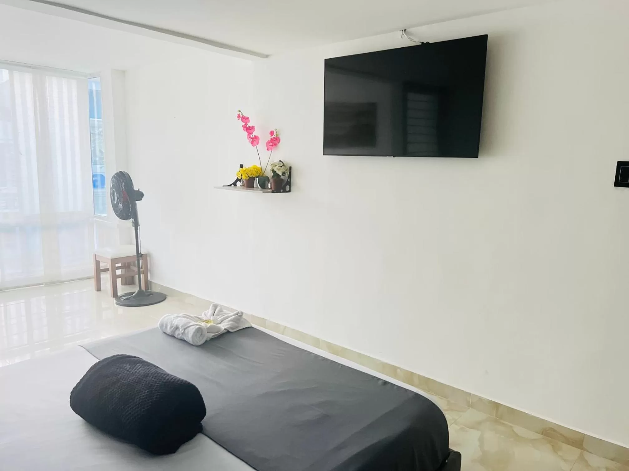 Photo of the whole room, TV/Entertainment Center in La Forêt de Café Hotel