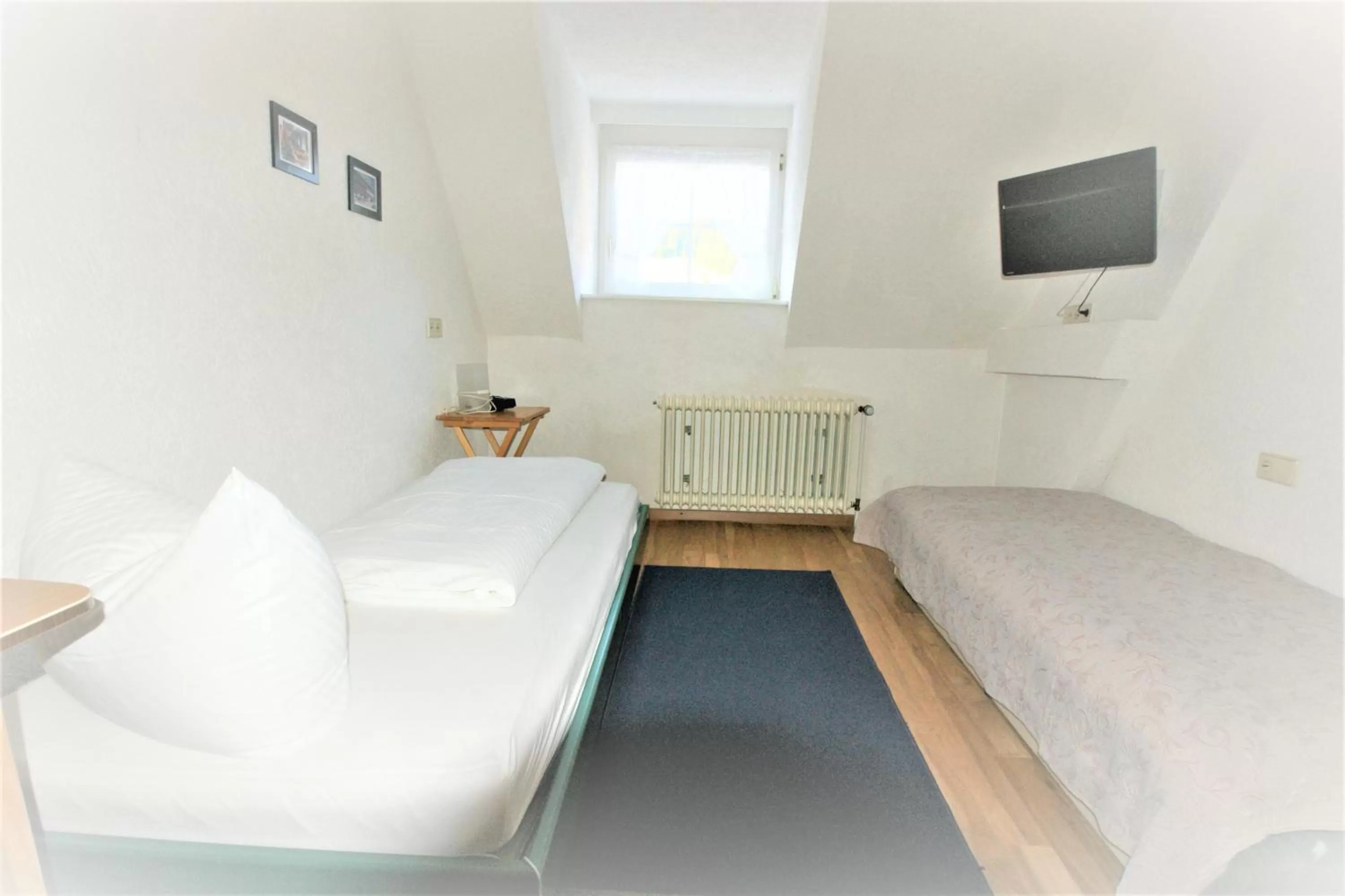 Photo of the whole room, Bed in ZUR TRAUBE Schwarzwaldhotel & Restaurant am Titisee