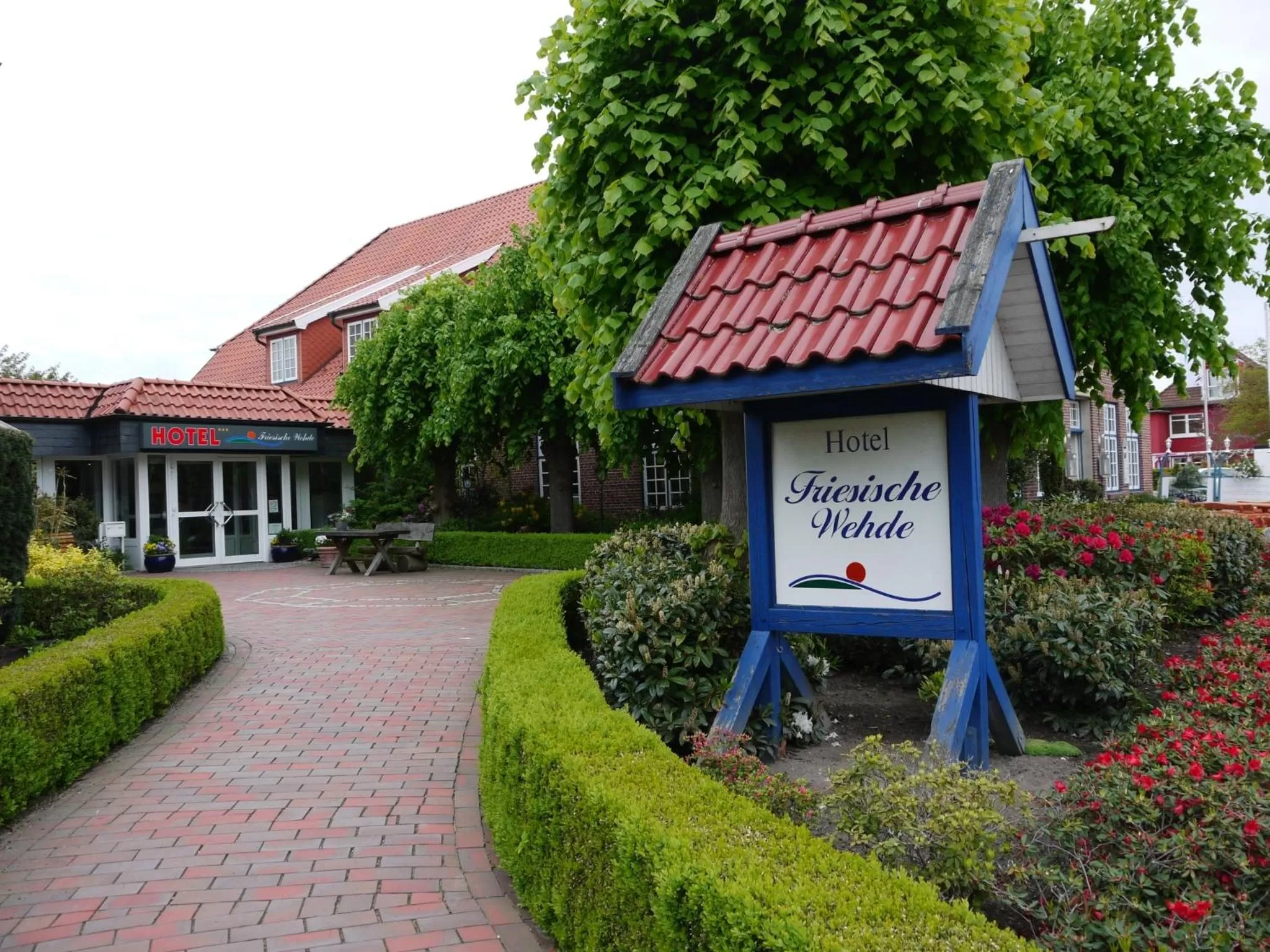 Facade/entrance in Hotel Friesische Wehde