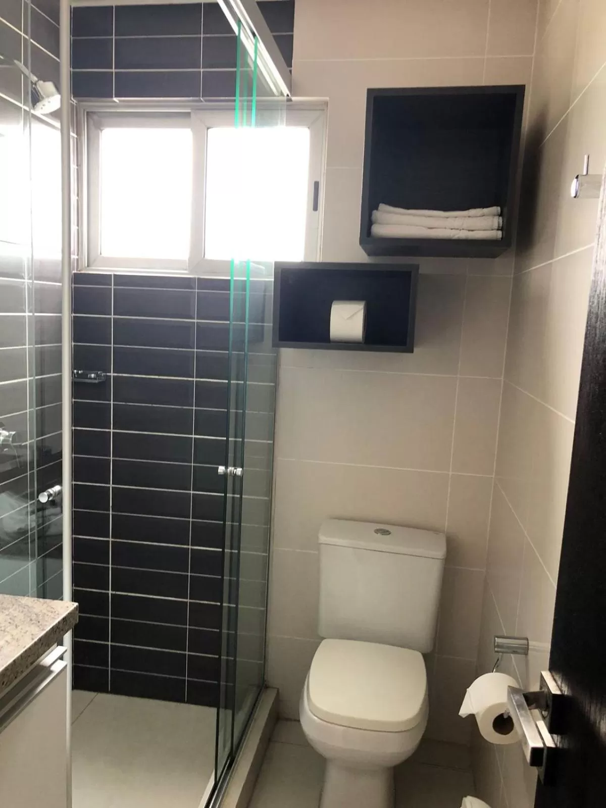 Shower in Urban Suites Apart Hotel