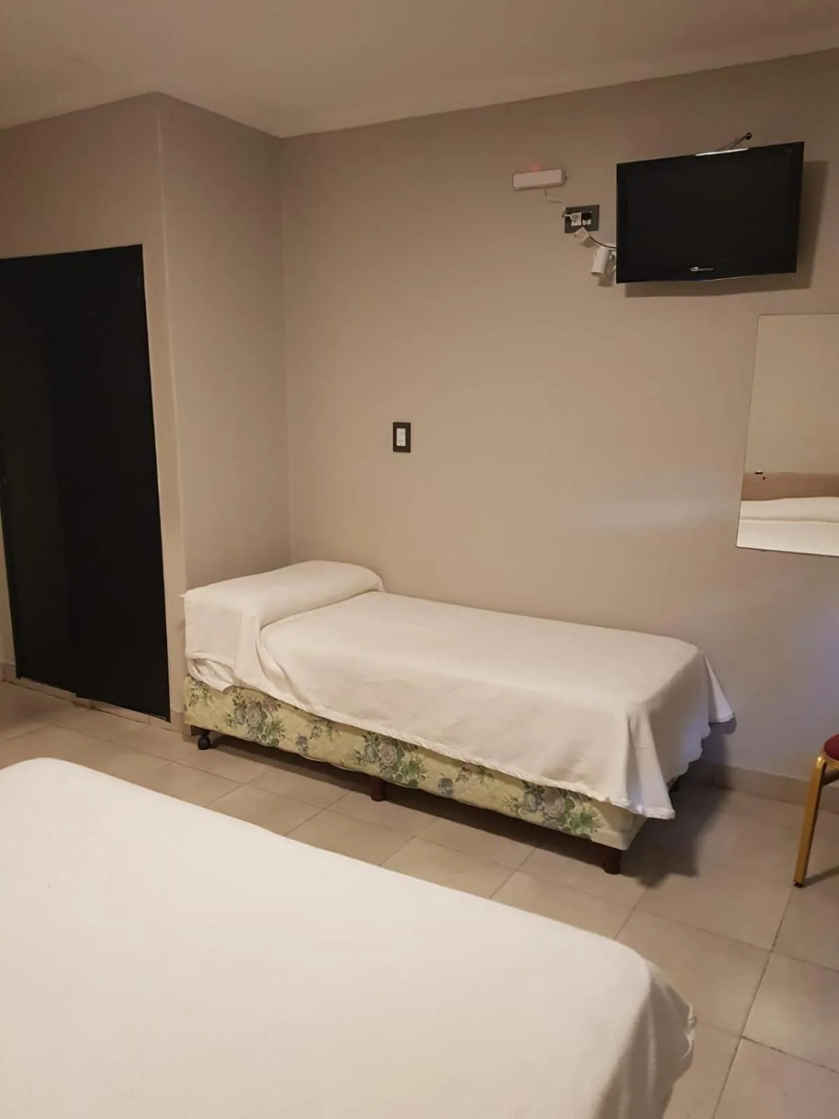 Bed in Hotel Marilian II