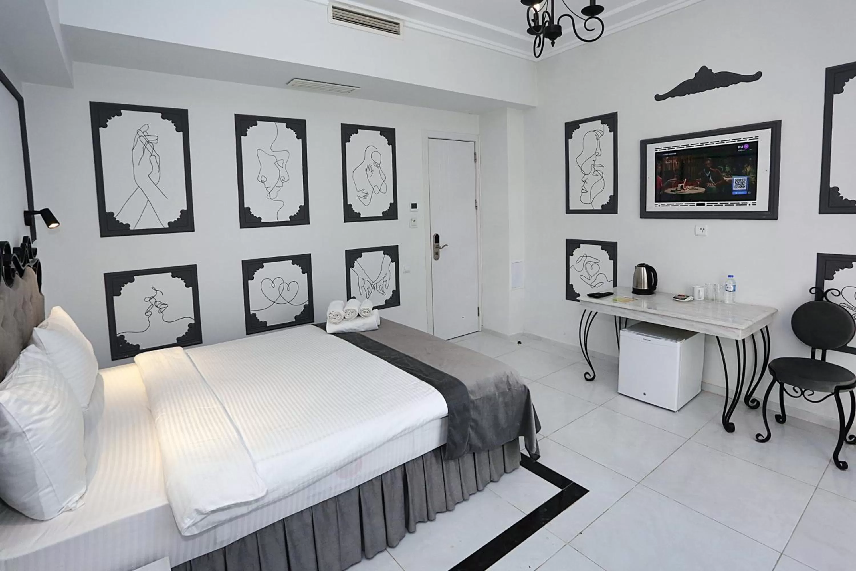 Photo of the whole room, Bed in The One Boutique