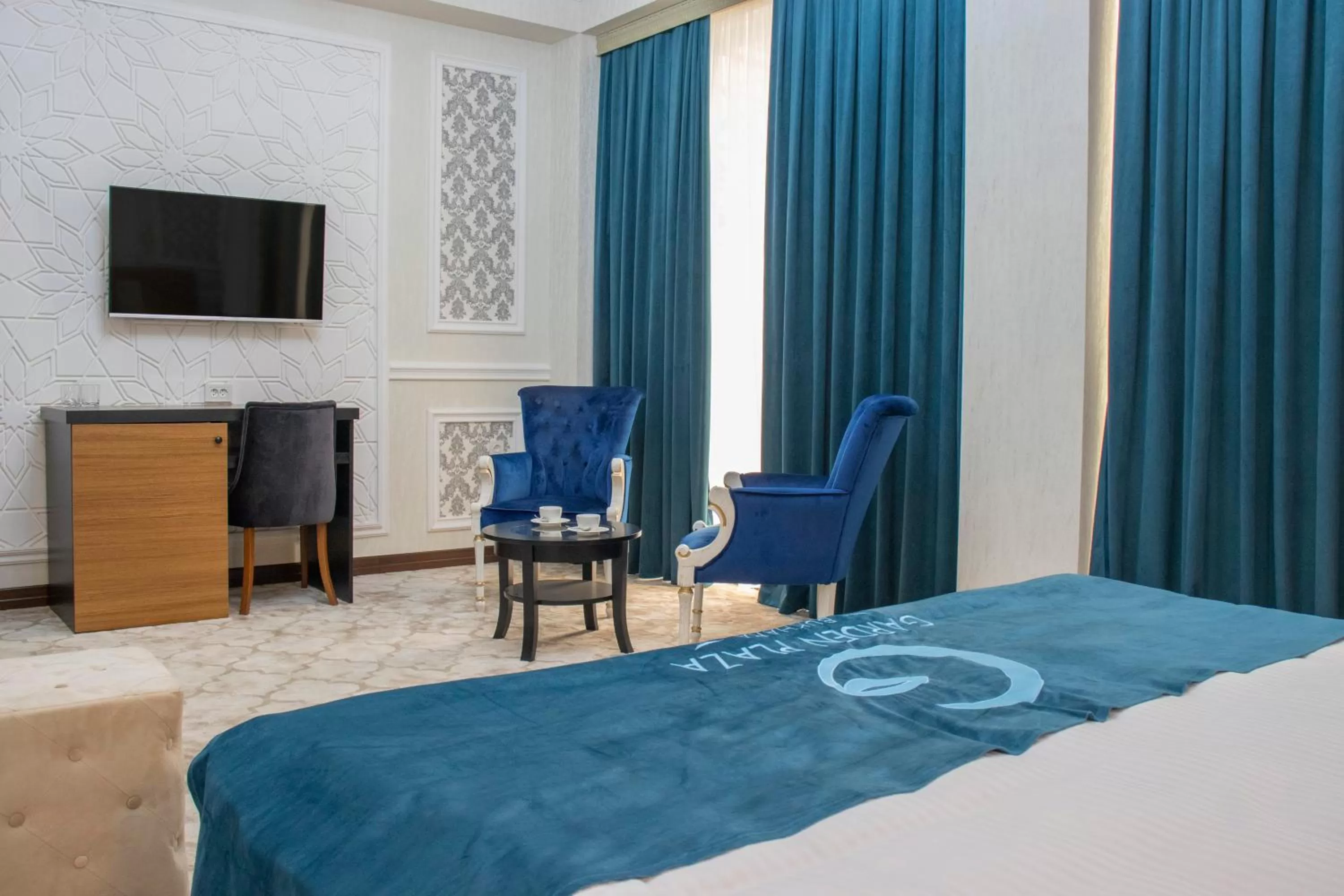 TV and multimedia, Bed in Garden Plaza Bukhara