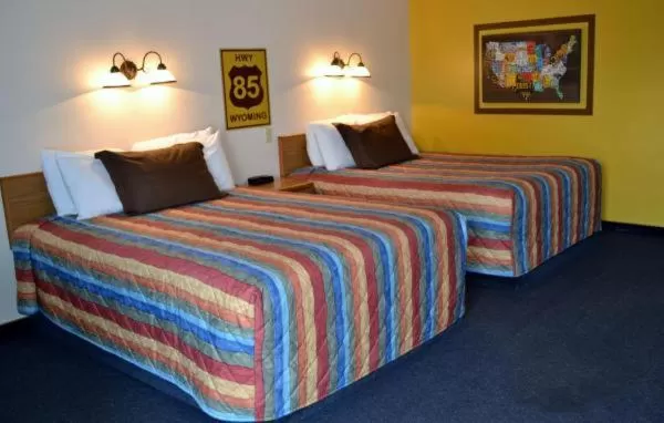 Bed in Covered Wagon Motel Lusk WY