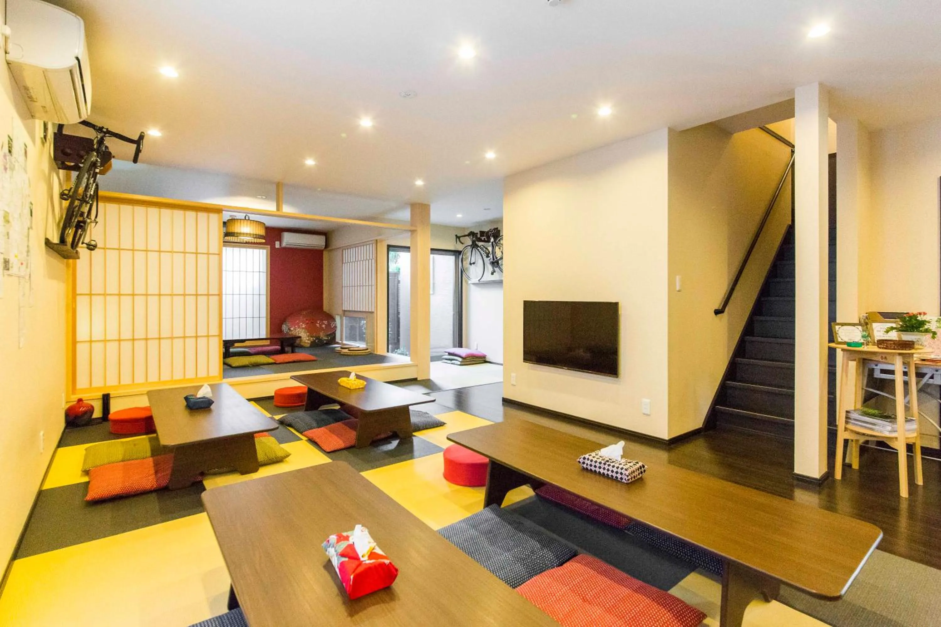 Communal lounge/ TV room in Fujitaya BnB