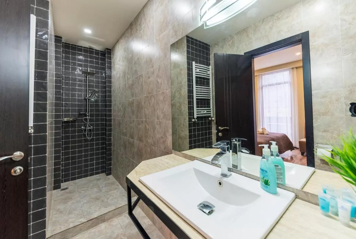 Shower in Sani Apart Hotel