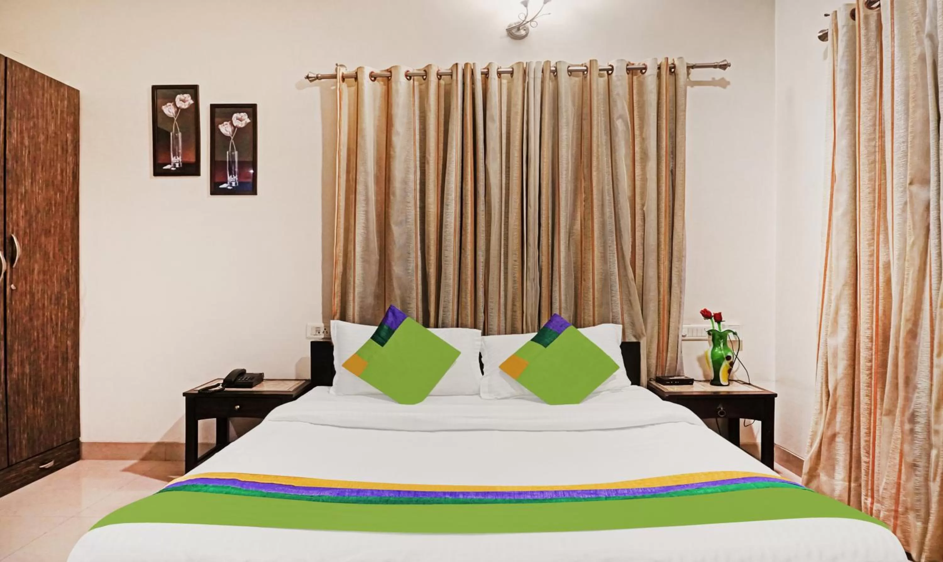 Bedroom, Bed in Treebo Excellent Home