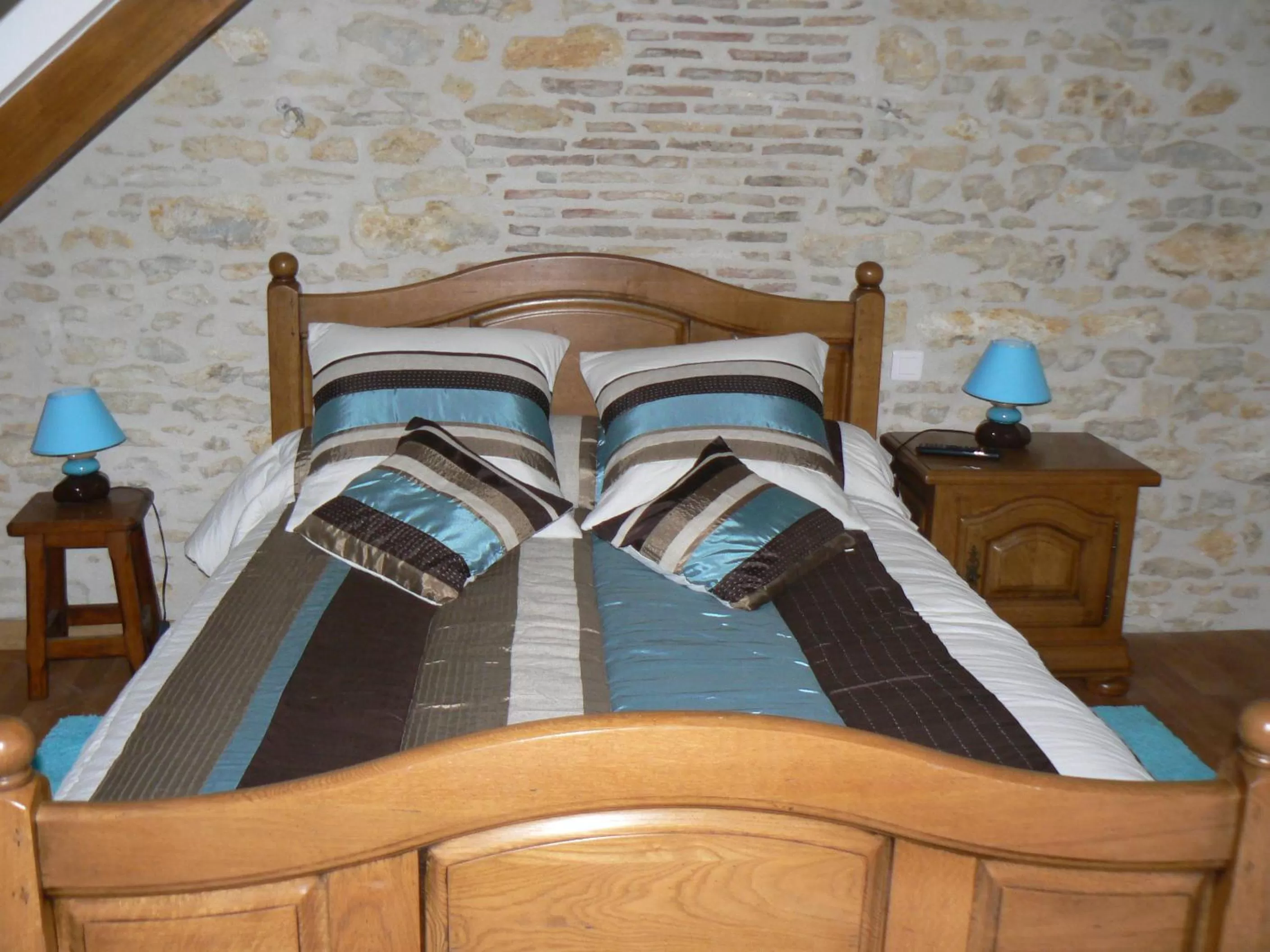 Bed in Le Manoir des Chapelles