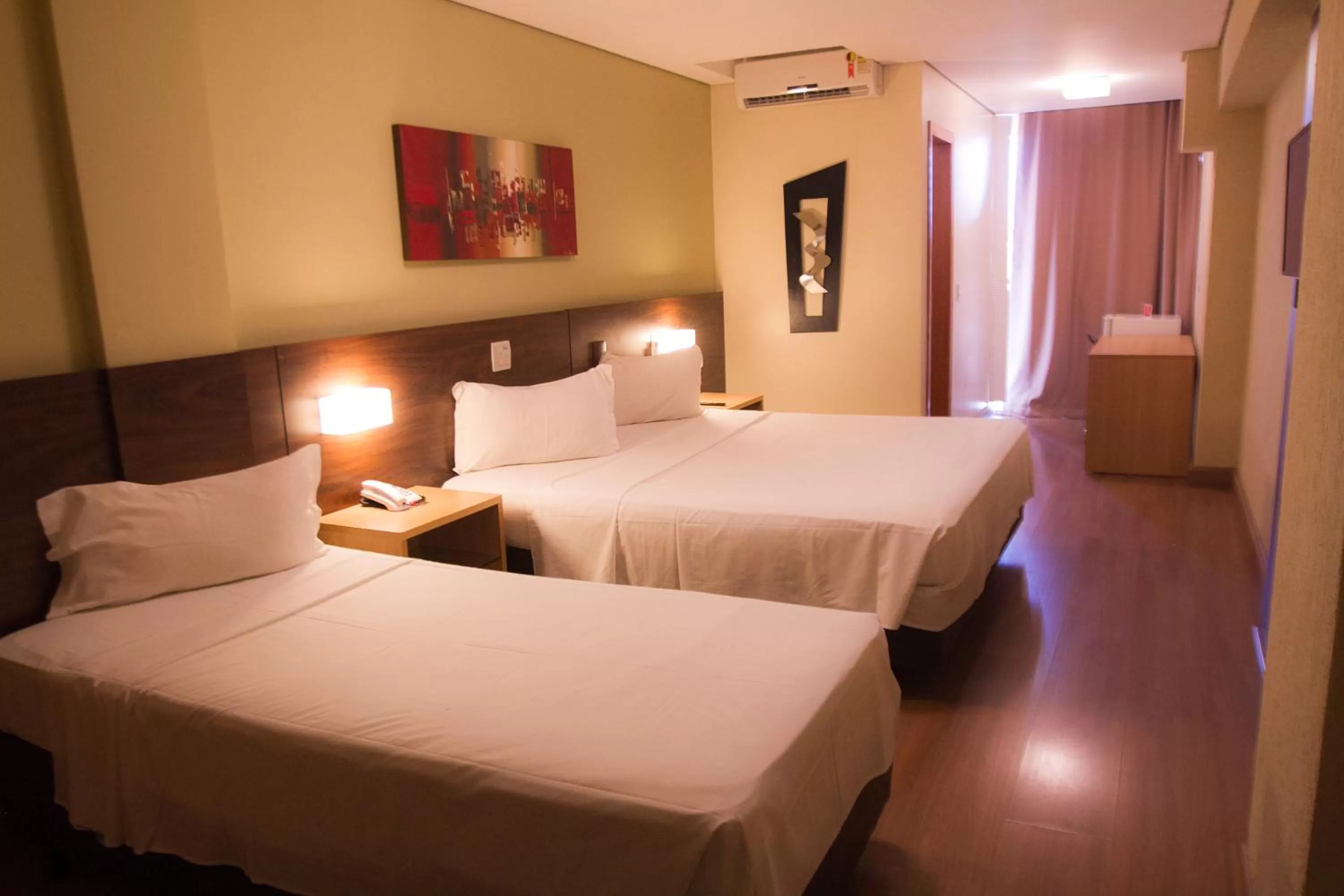 Bed in Ramada Hotel & Suites Lagoa Santa By Wyndham