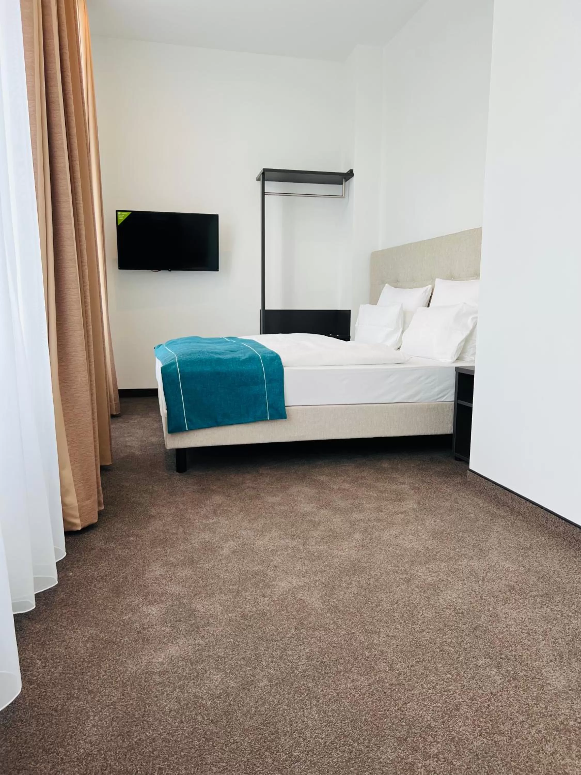 Bed in The Monument Hotel - BW Signature Collection