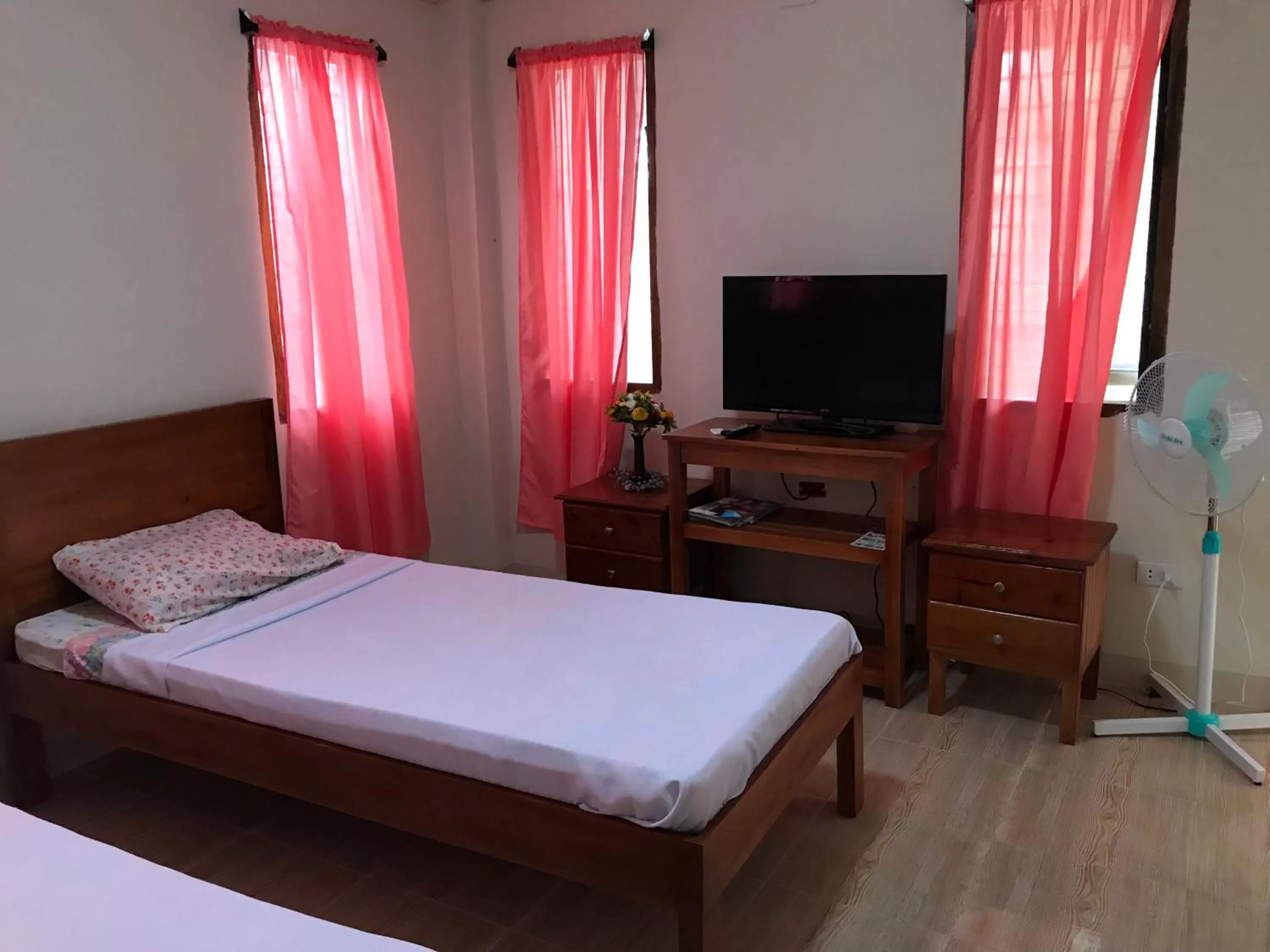 Bed in D's Oceanview Beach Resort