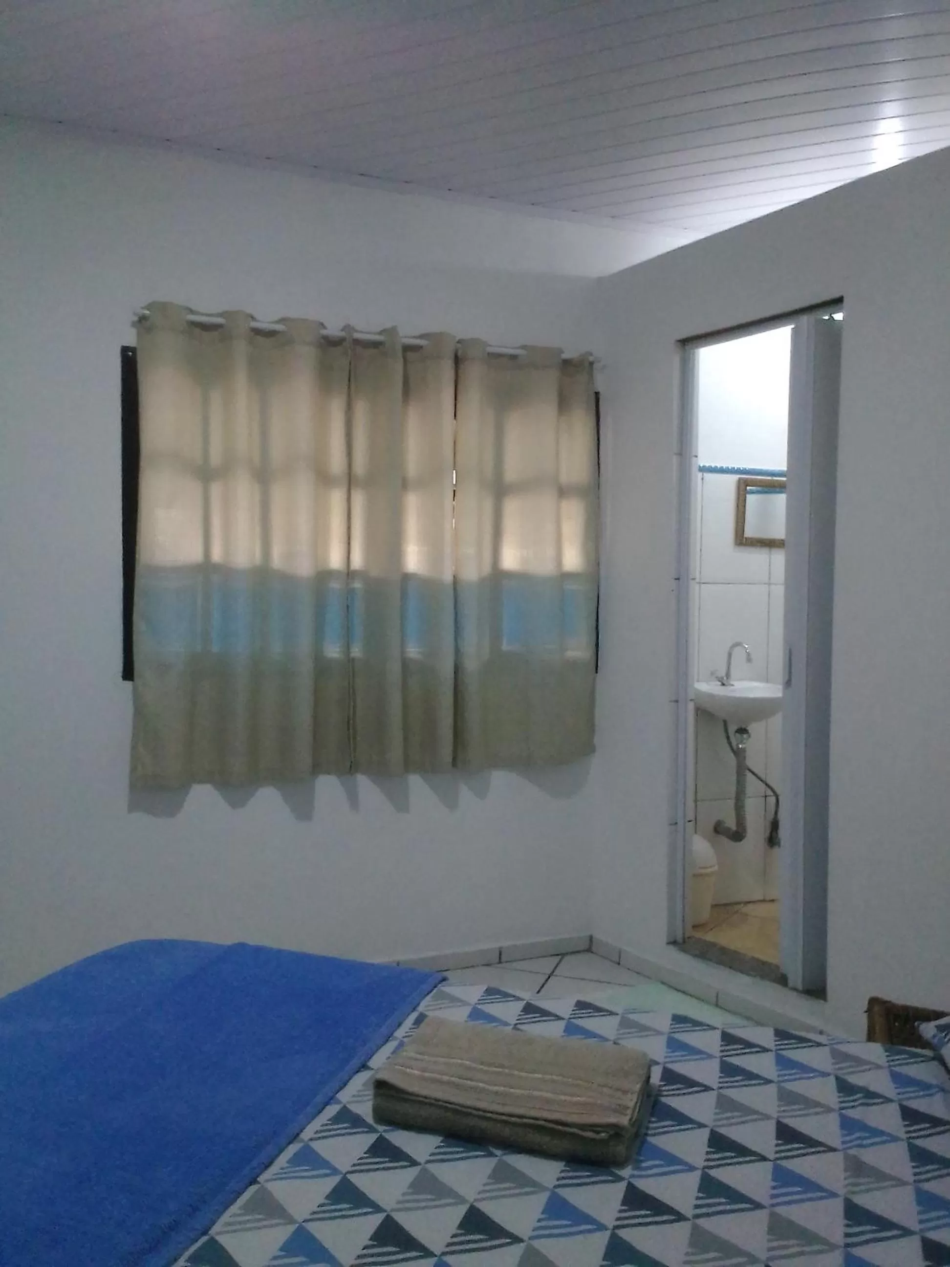 Bed in Hospedagem Pousada Fantasia Paraty