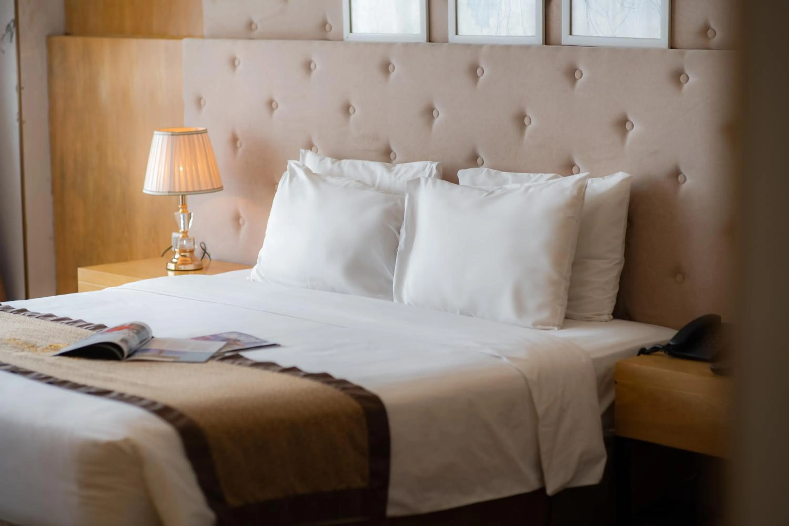 Bed in Riverside Hanoi Hotel