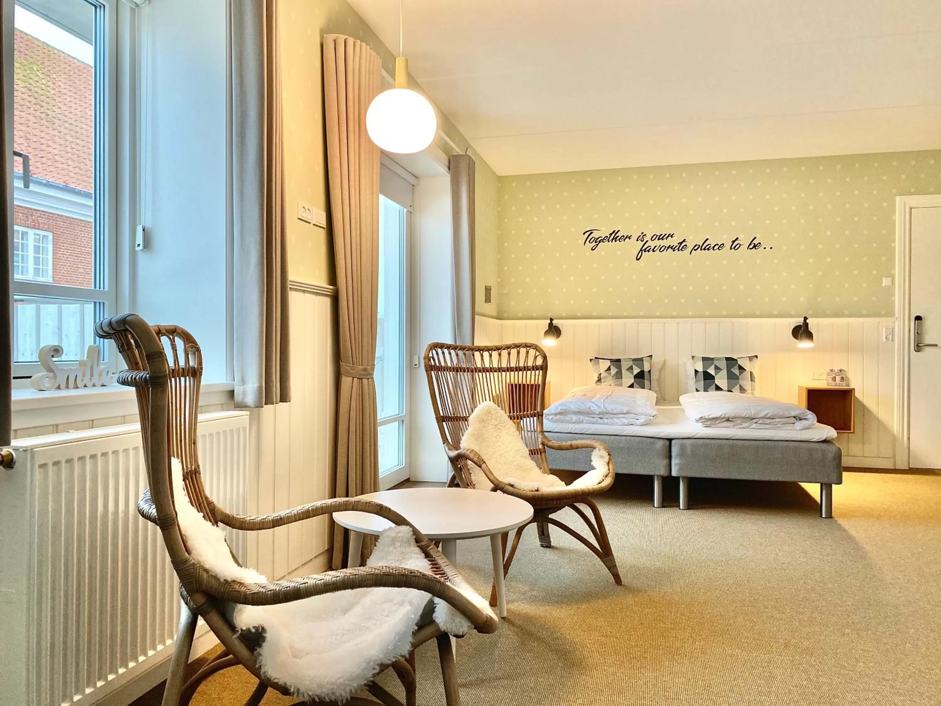 Living room, Bed in Hotel Marie