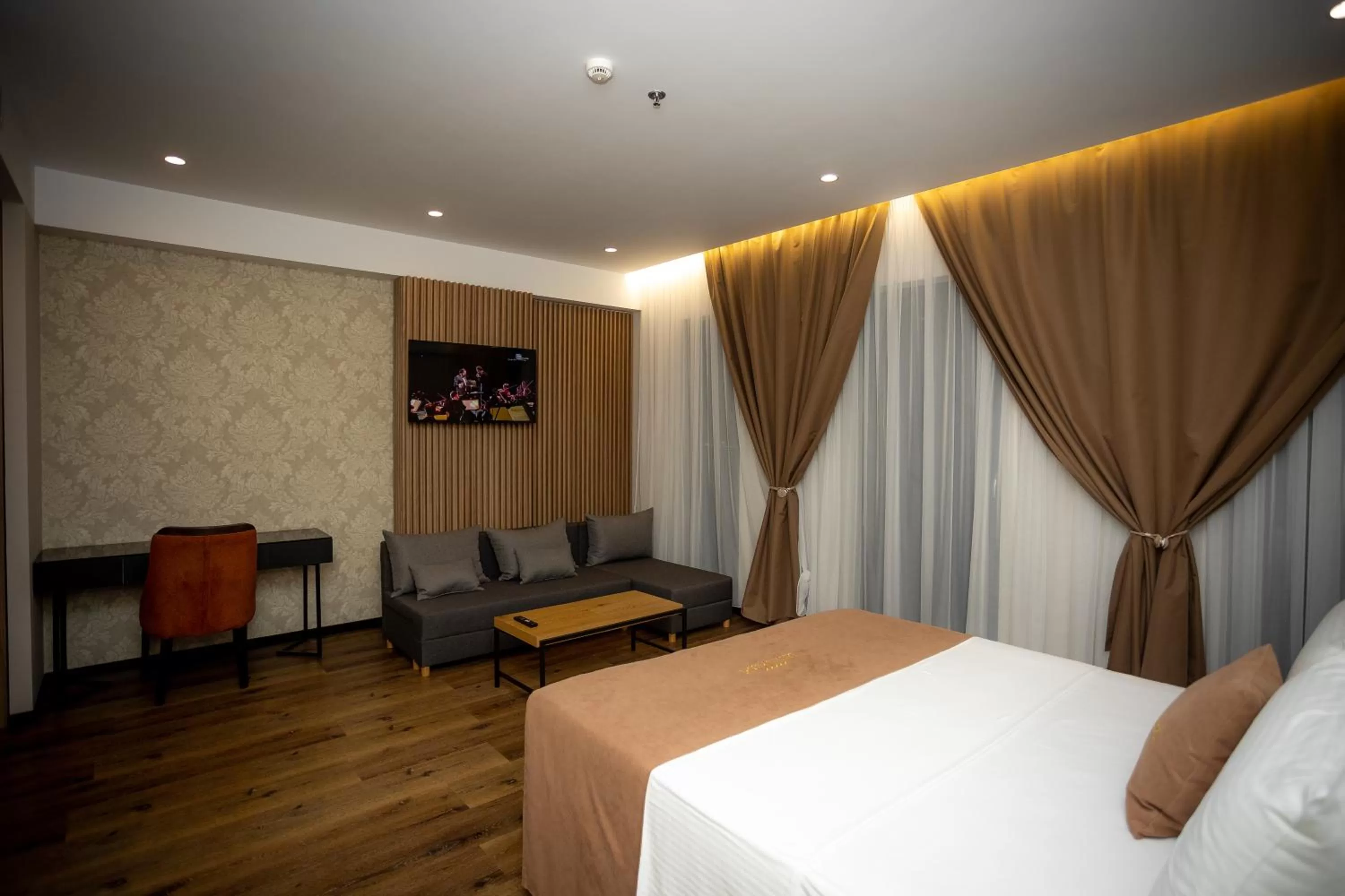 Photo of the whole room, Seating Area in Deluxe Resort and SPA