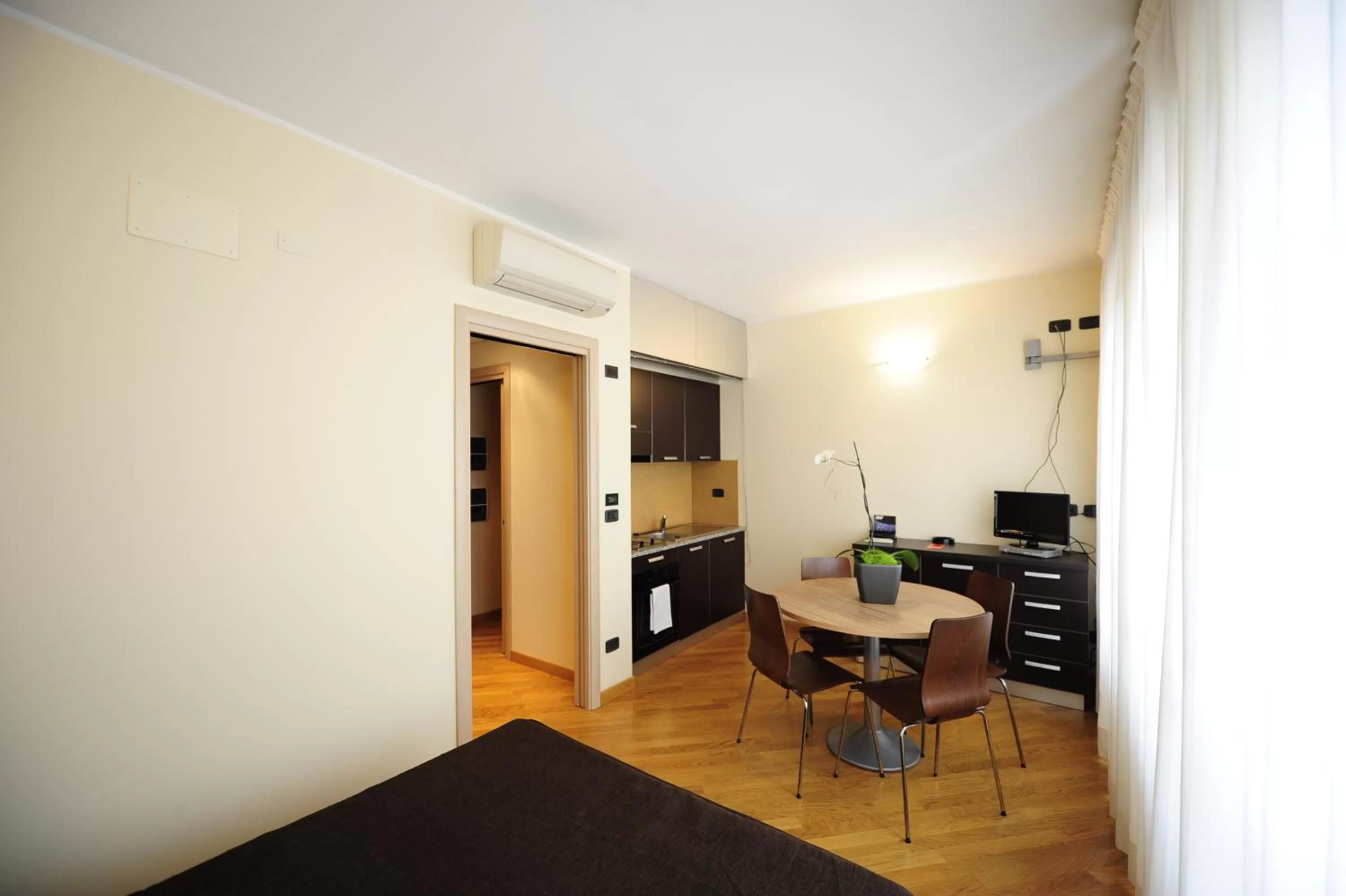 Dining Area in Corvetto Residence Porto Di Mare