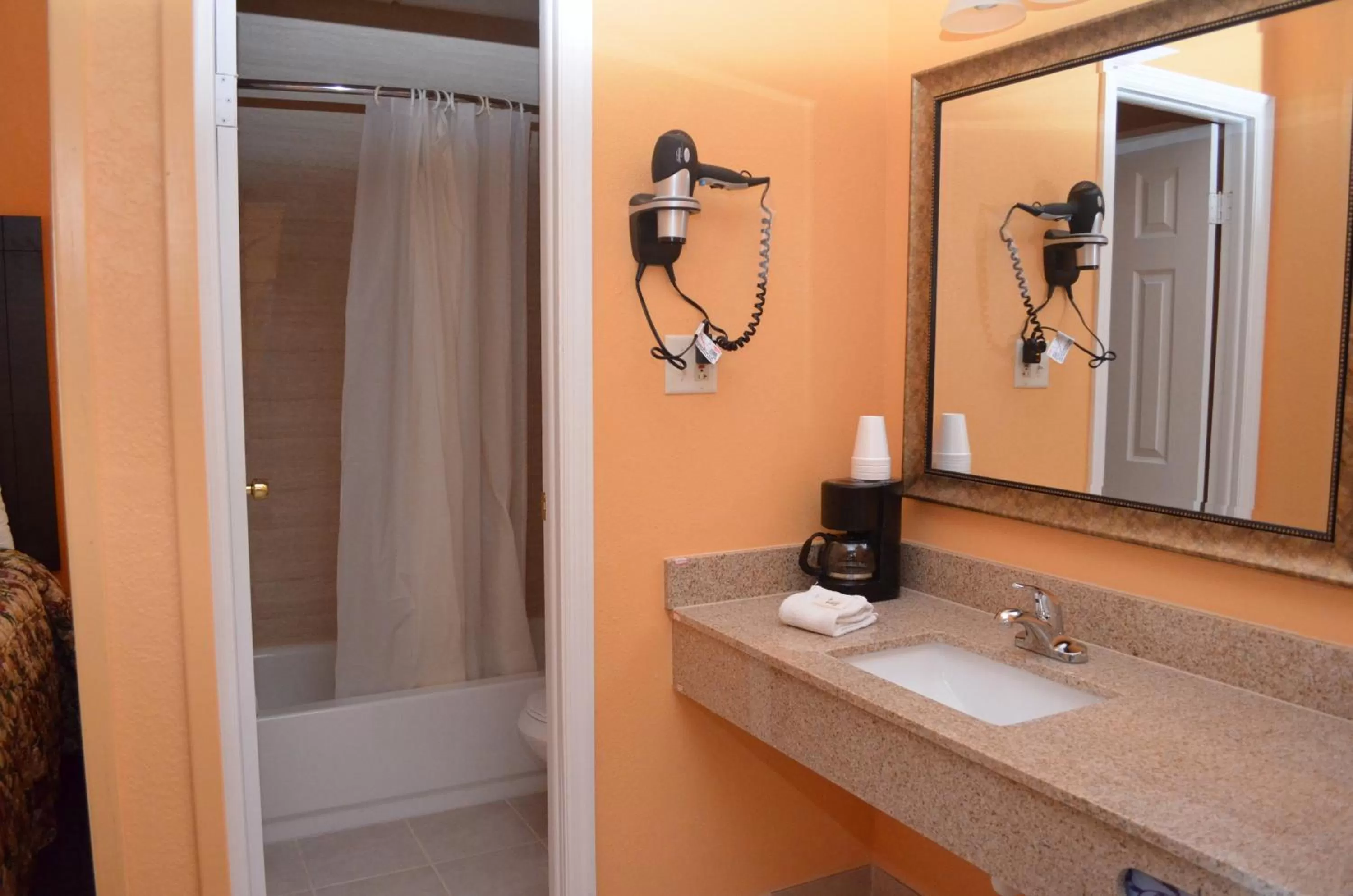 Bathroom in Days Inn by Wyndham Queensbury/Lake George