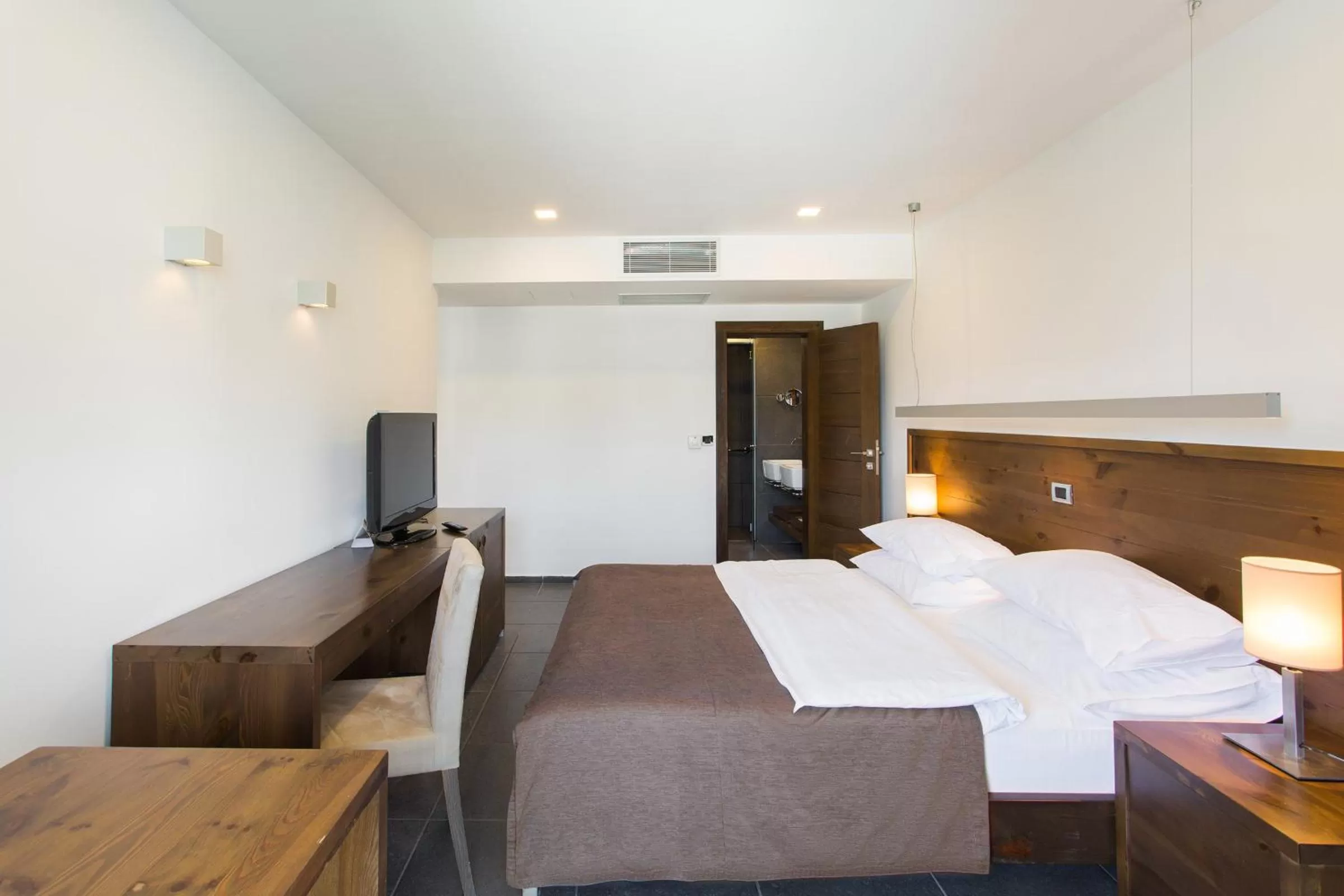 Bed in Avala Resort & Villas