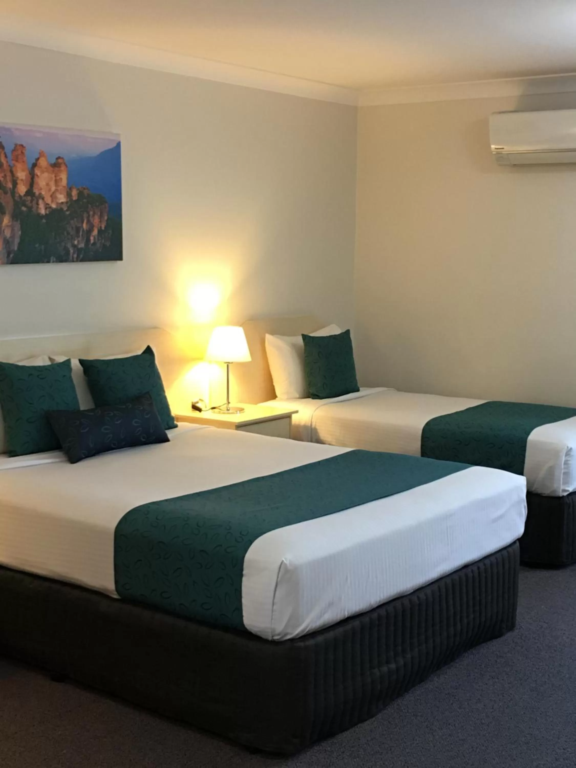 Bed in Tuckerbox Motor Inn