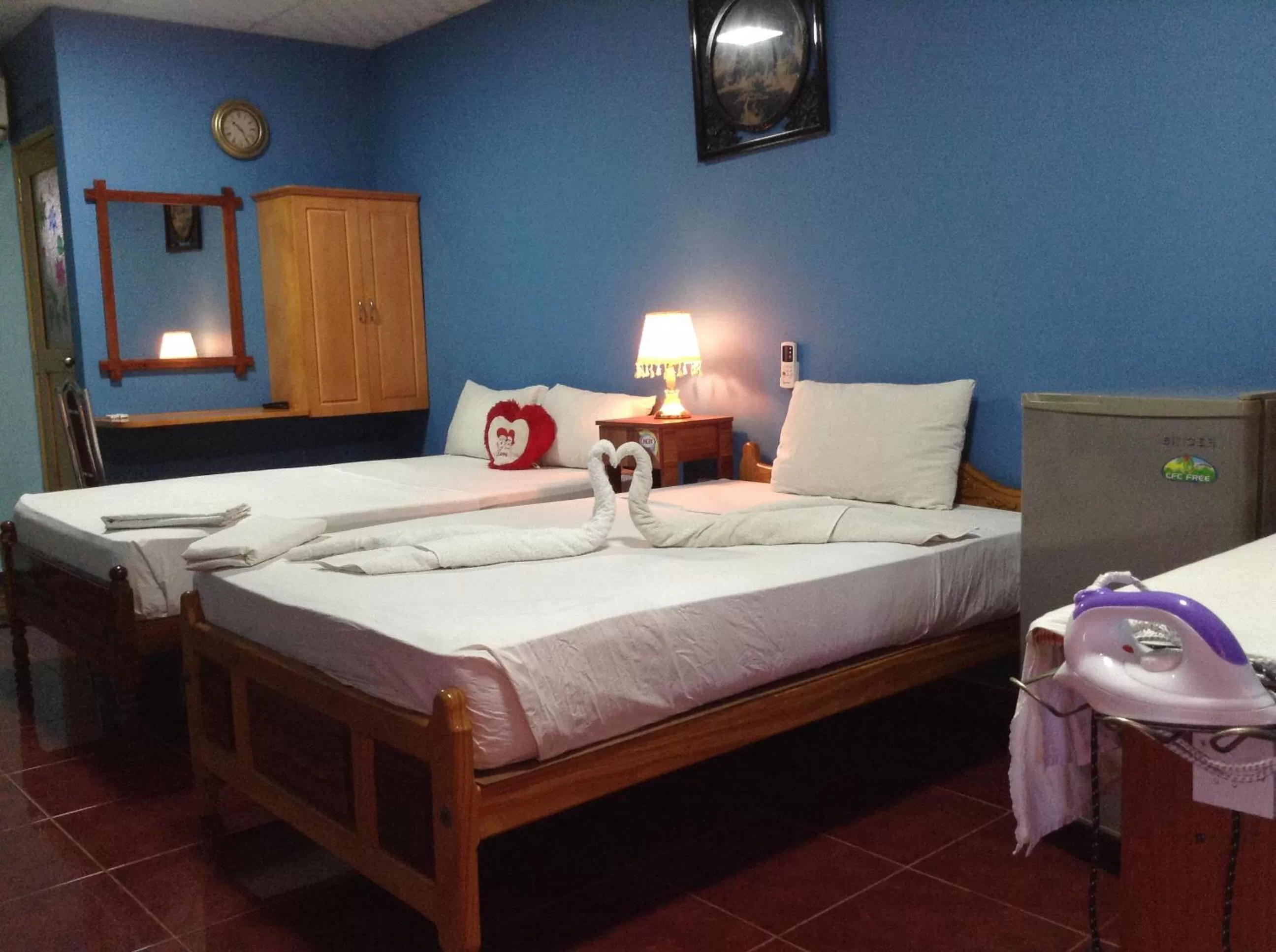 Bed in Sunshine Hotel