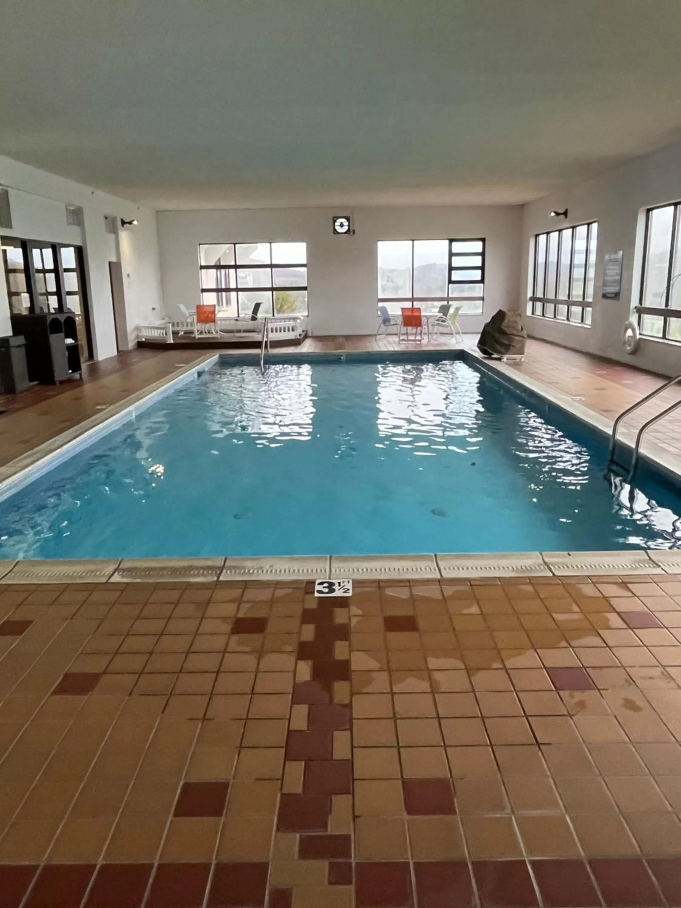 Pool view in Days Inn & Suites by Wyndham Sutton Flatwoods