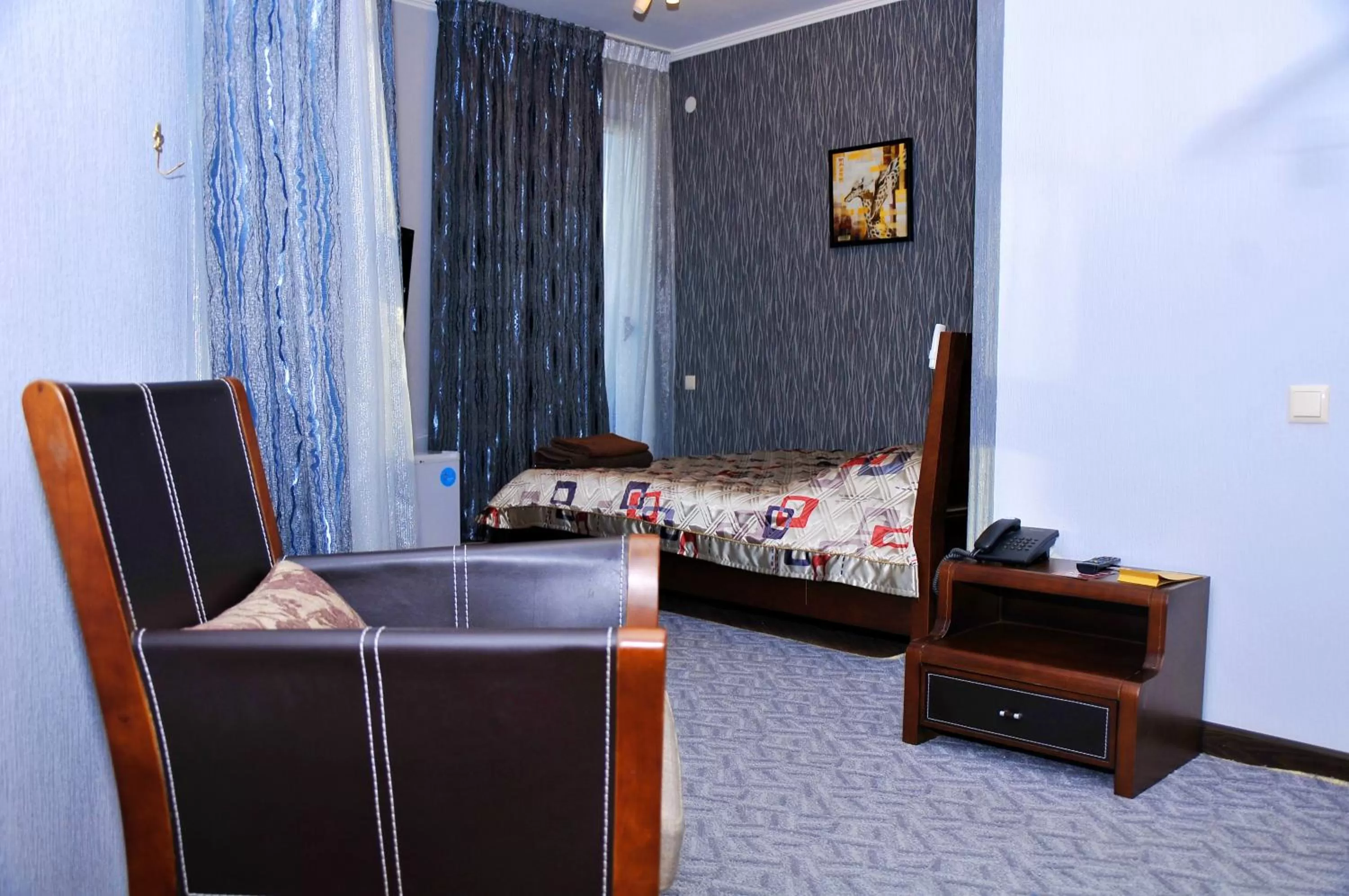 Photo of the whole room, Bed in Totem Hotel