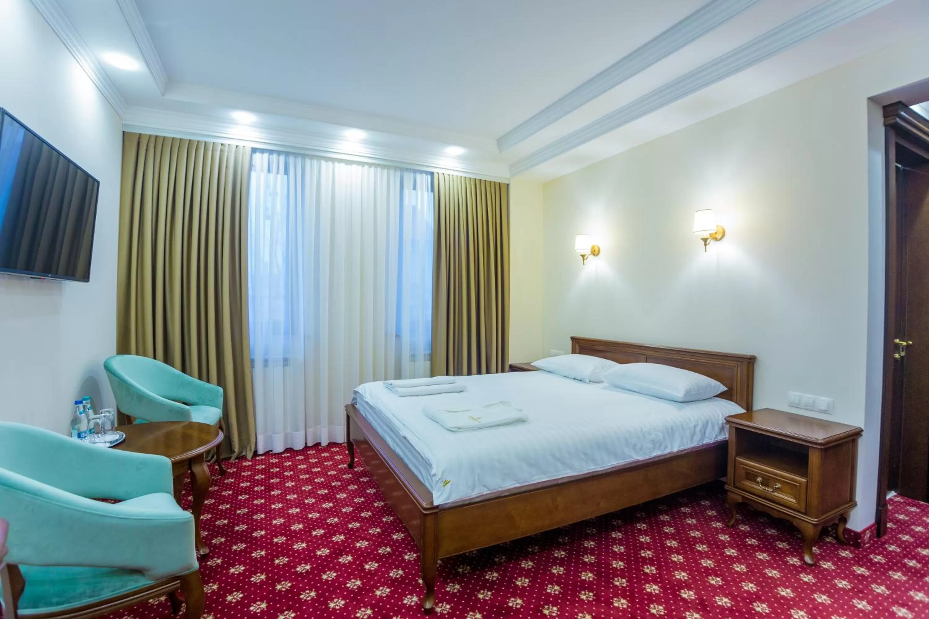 Photo of the whole room, Bed in Ambassador Hotel