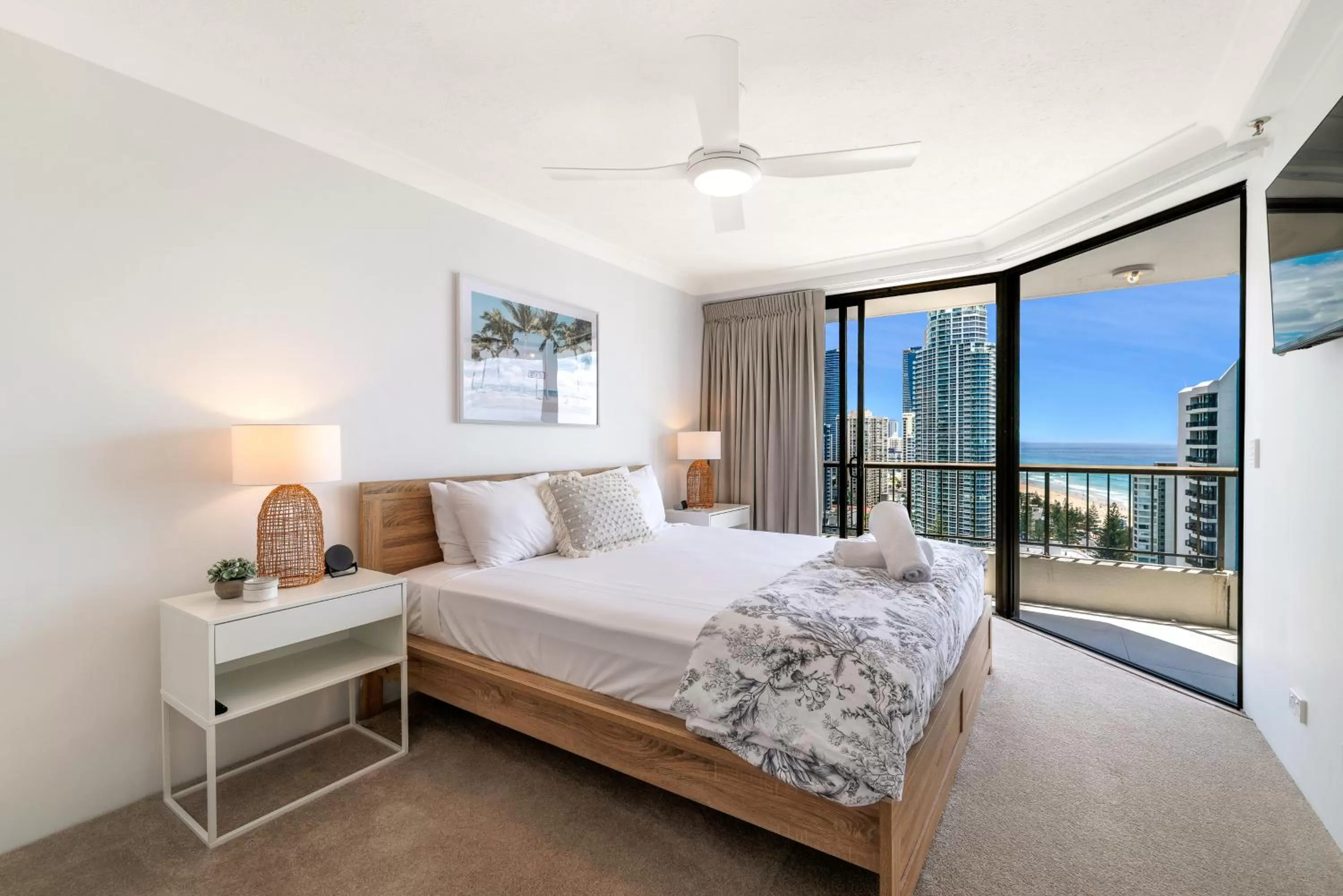 Bed in Surfers Century Oceanside Apartments