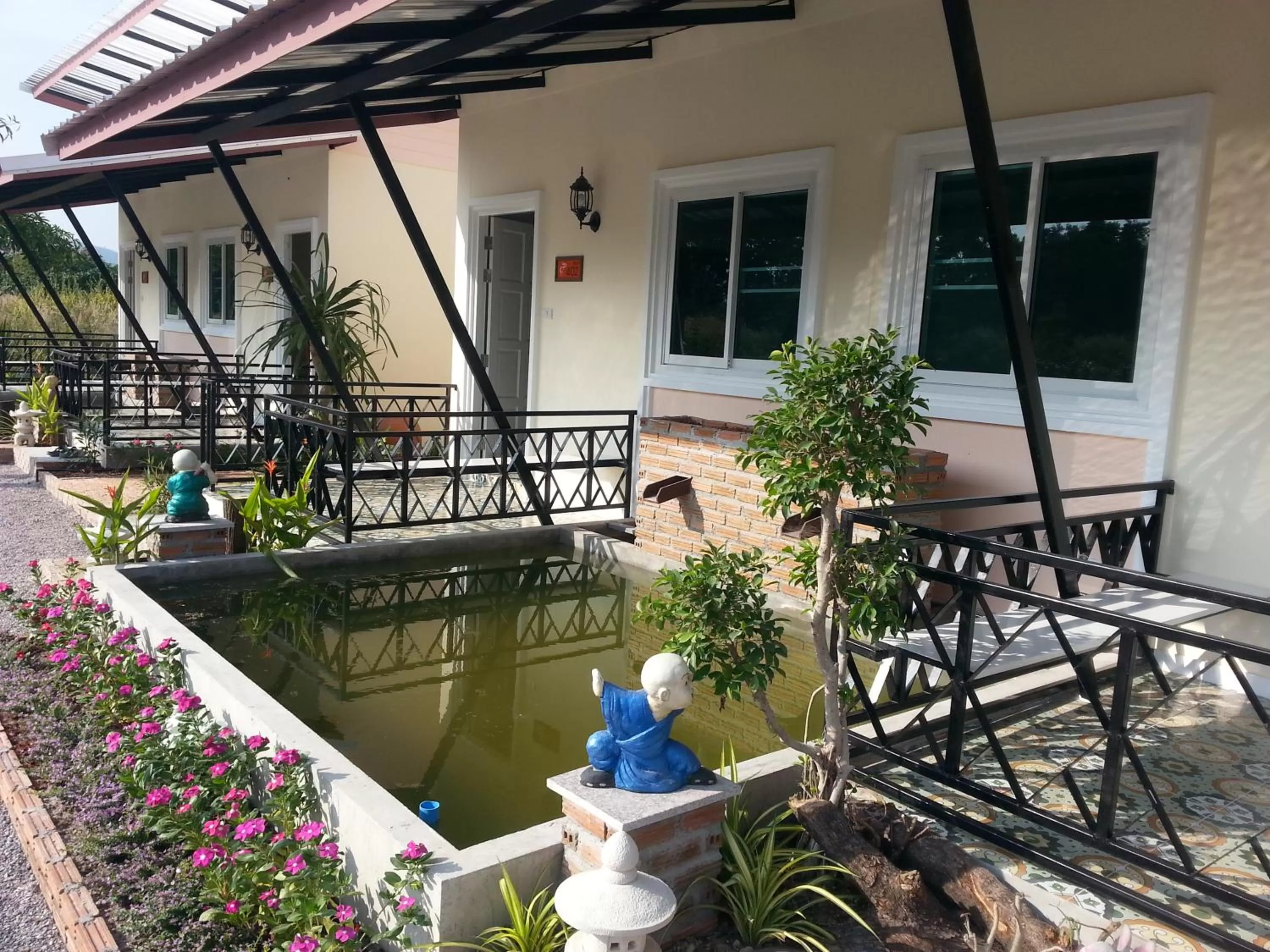 Facade/entrance, Balcony/Terrace in Fancy Carp Resort