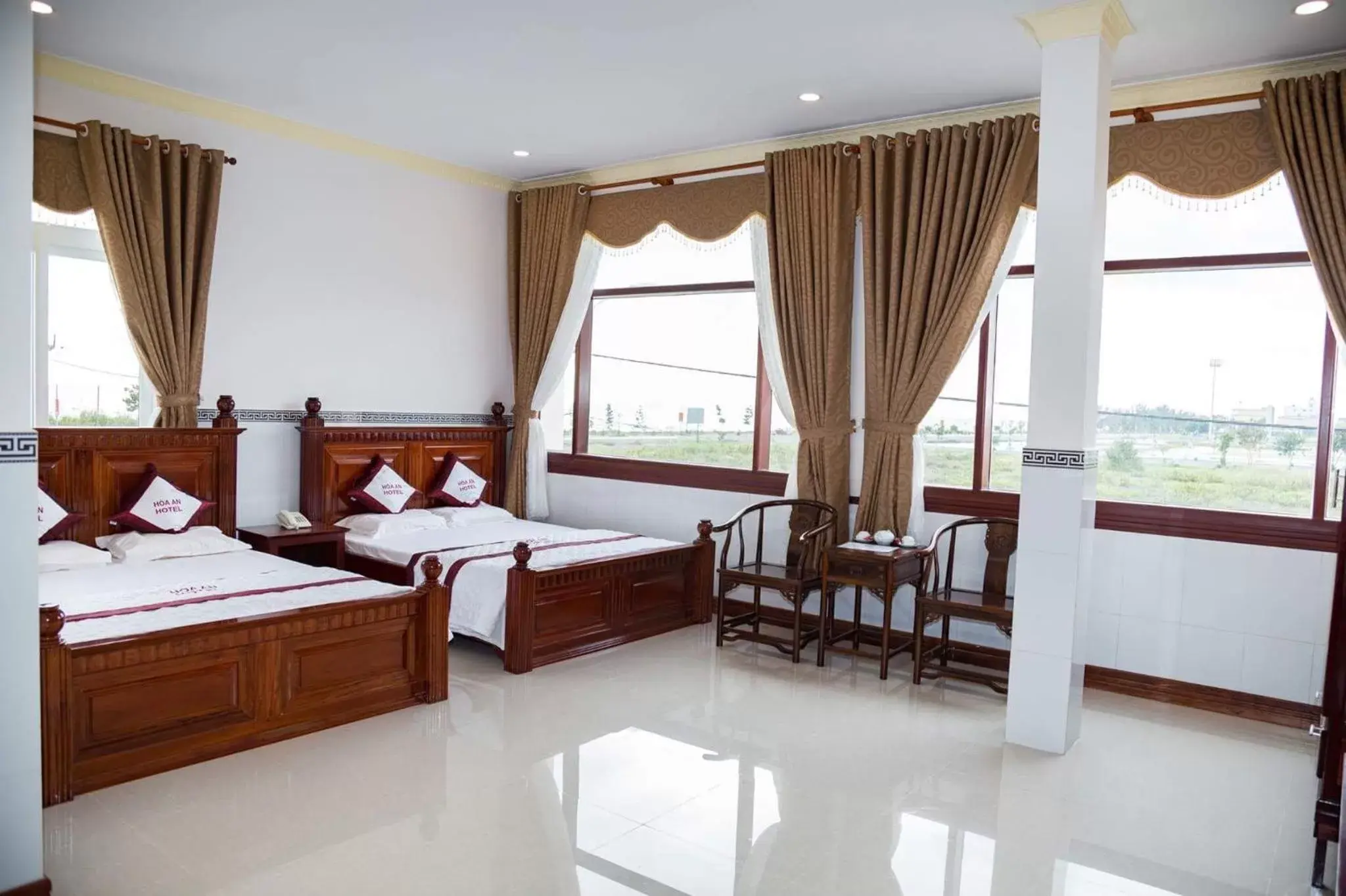 Quadruple Room with Garden View in Hoa An Hotel Quadruple Room with Garden View in Hoa An Hotel