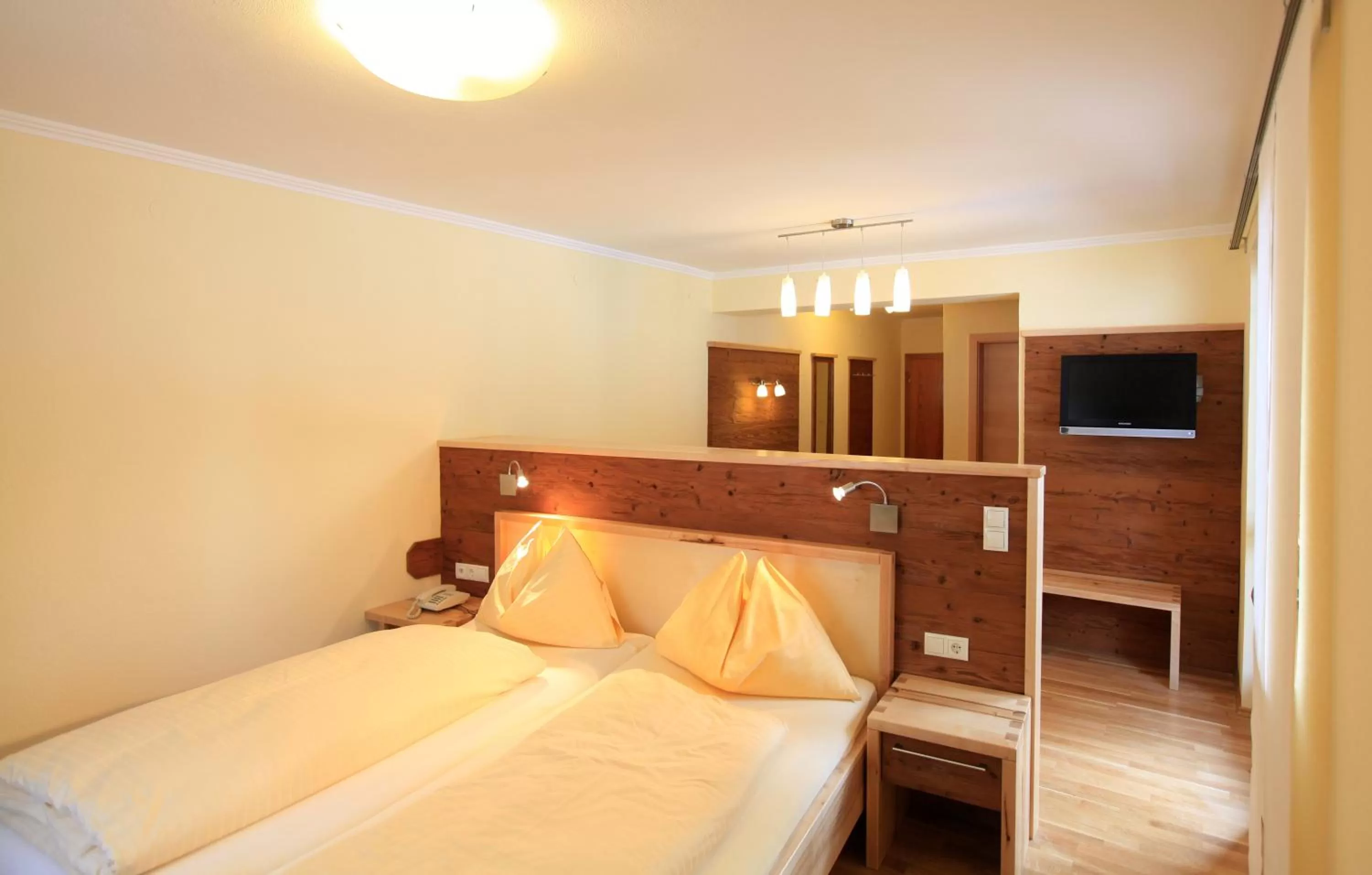 Bedroom, Bed in Naturhotel Lärchenhof