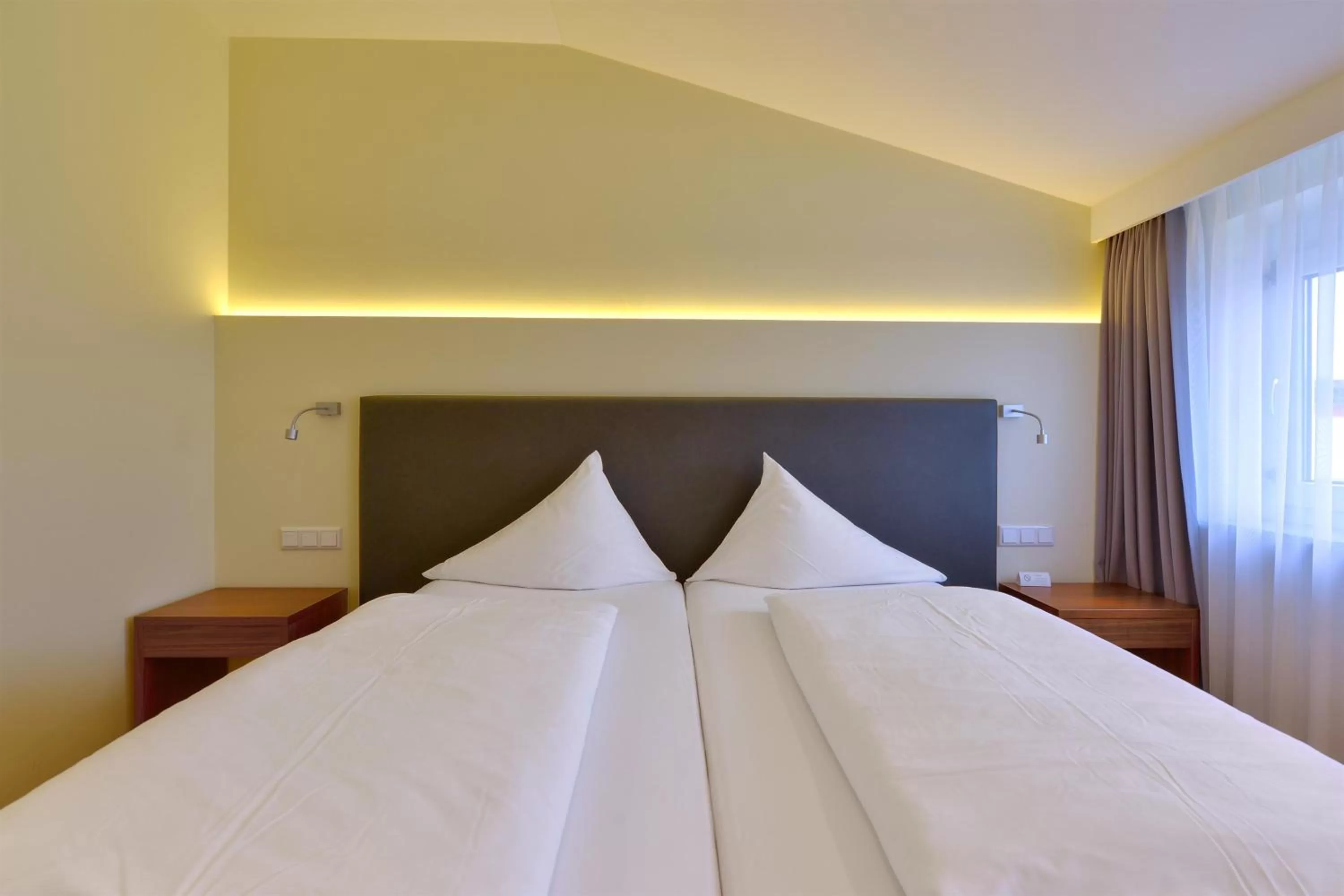 Bed in Hotel Apfelbaum