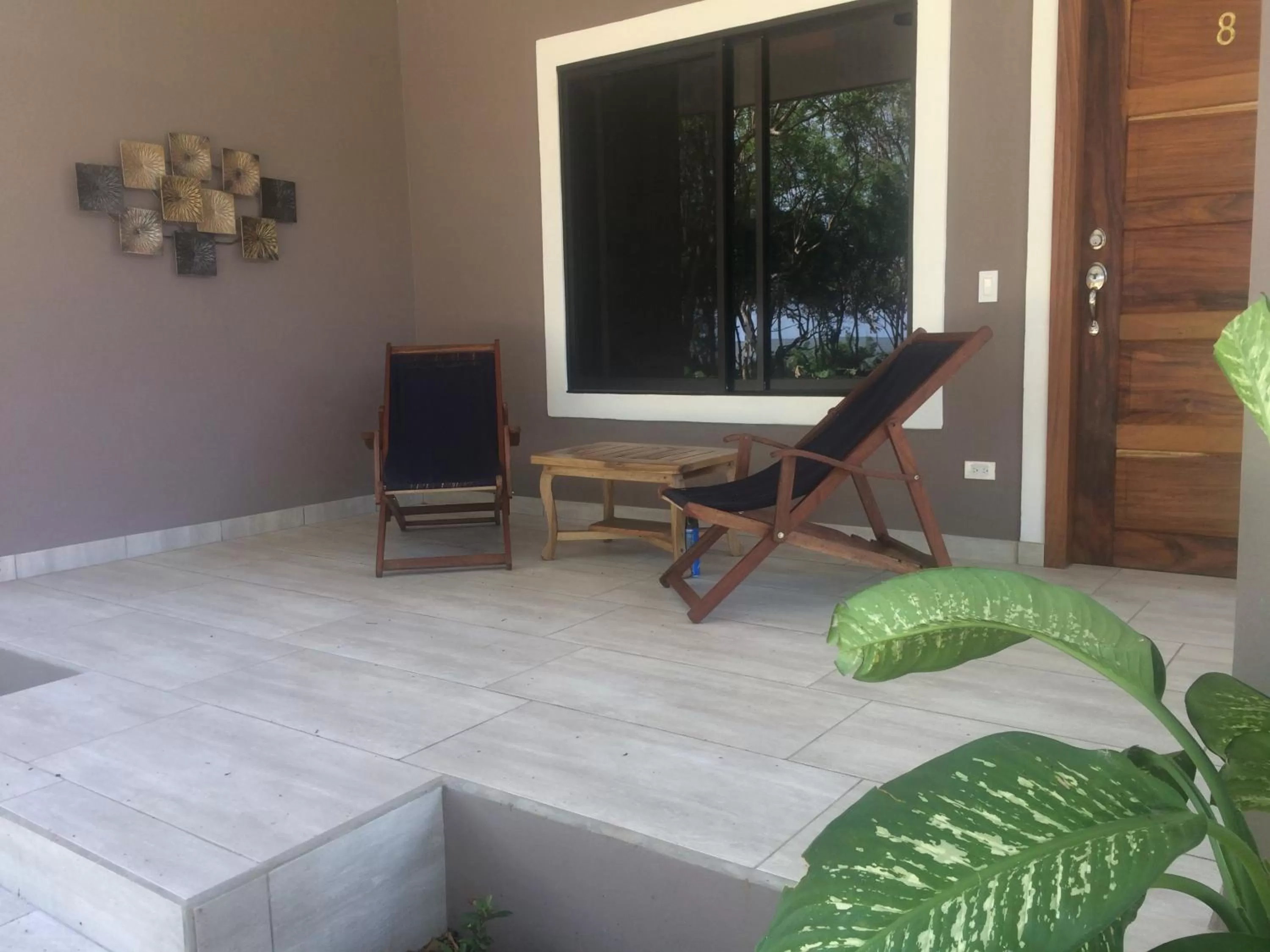 Patio, TV/Entertainment Center in Xalli Beach Hotel