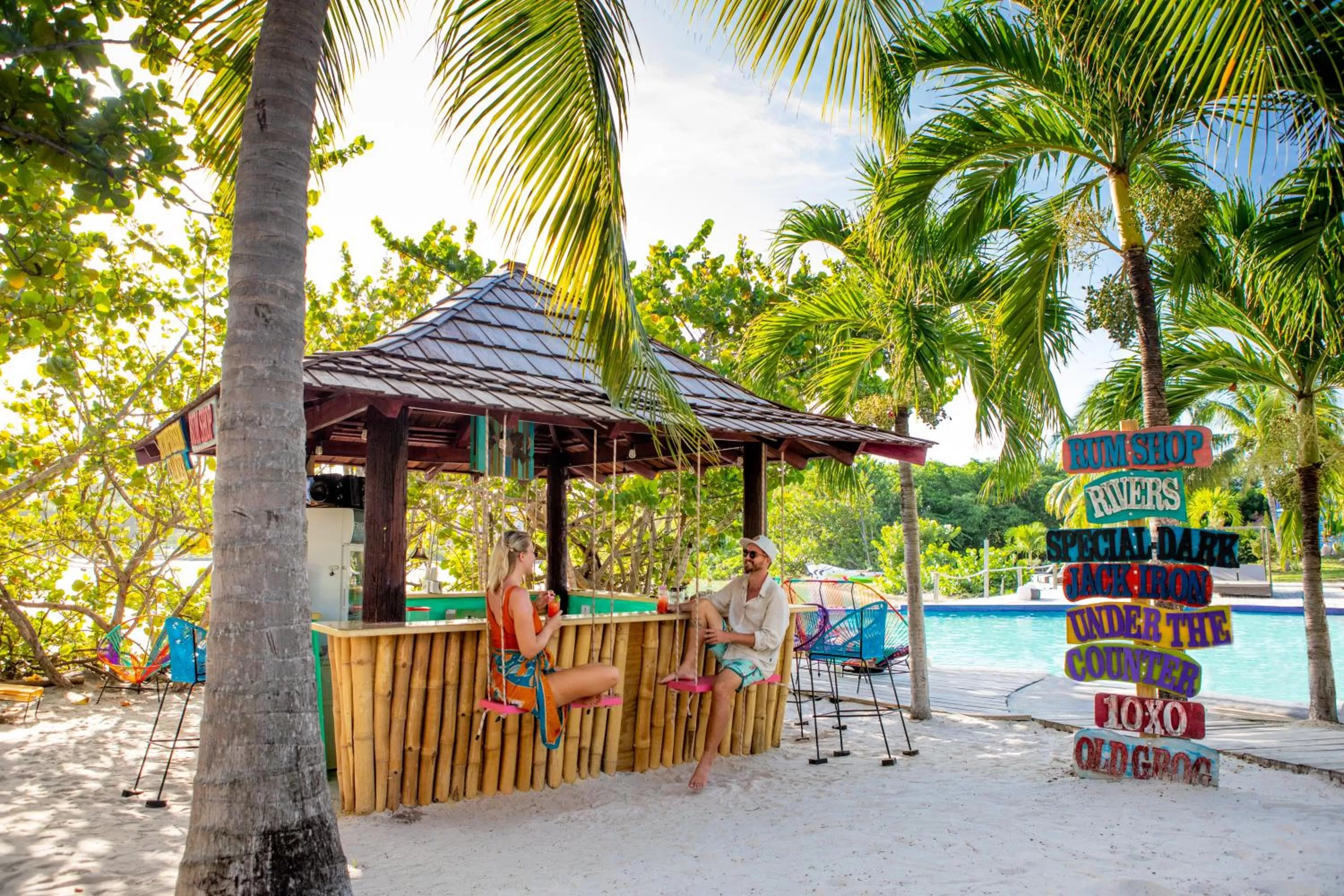 Lounge or bar in True Blue Bay Resort