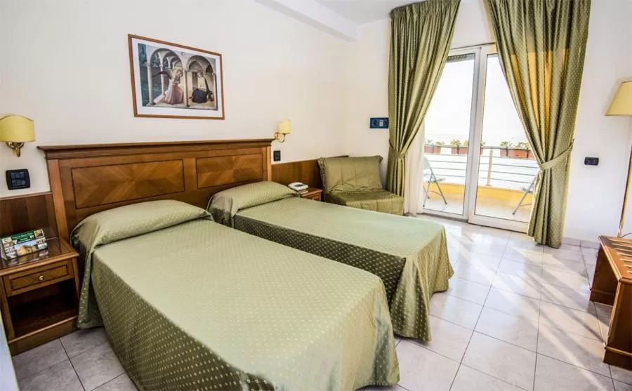 Bed in Grand Hotel Victoria