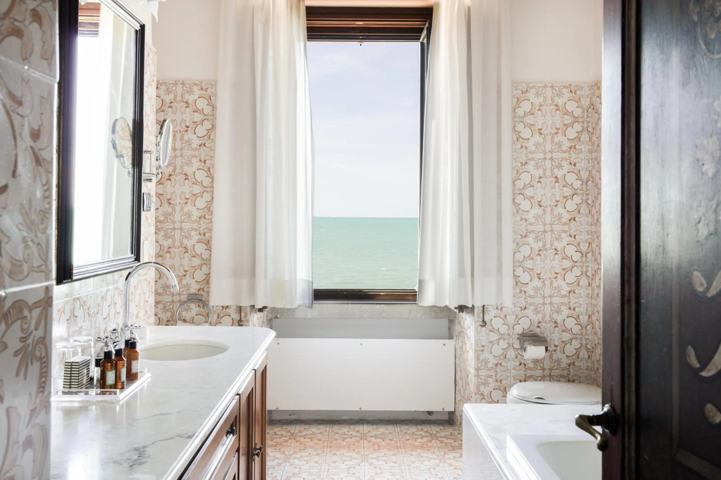 Bathroom in La Posta Vecchia Hotel