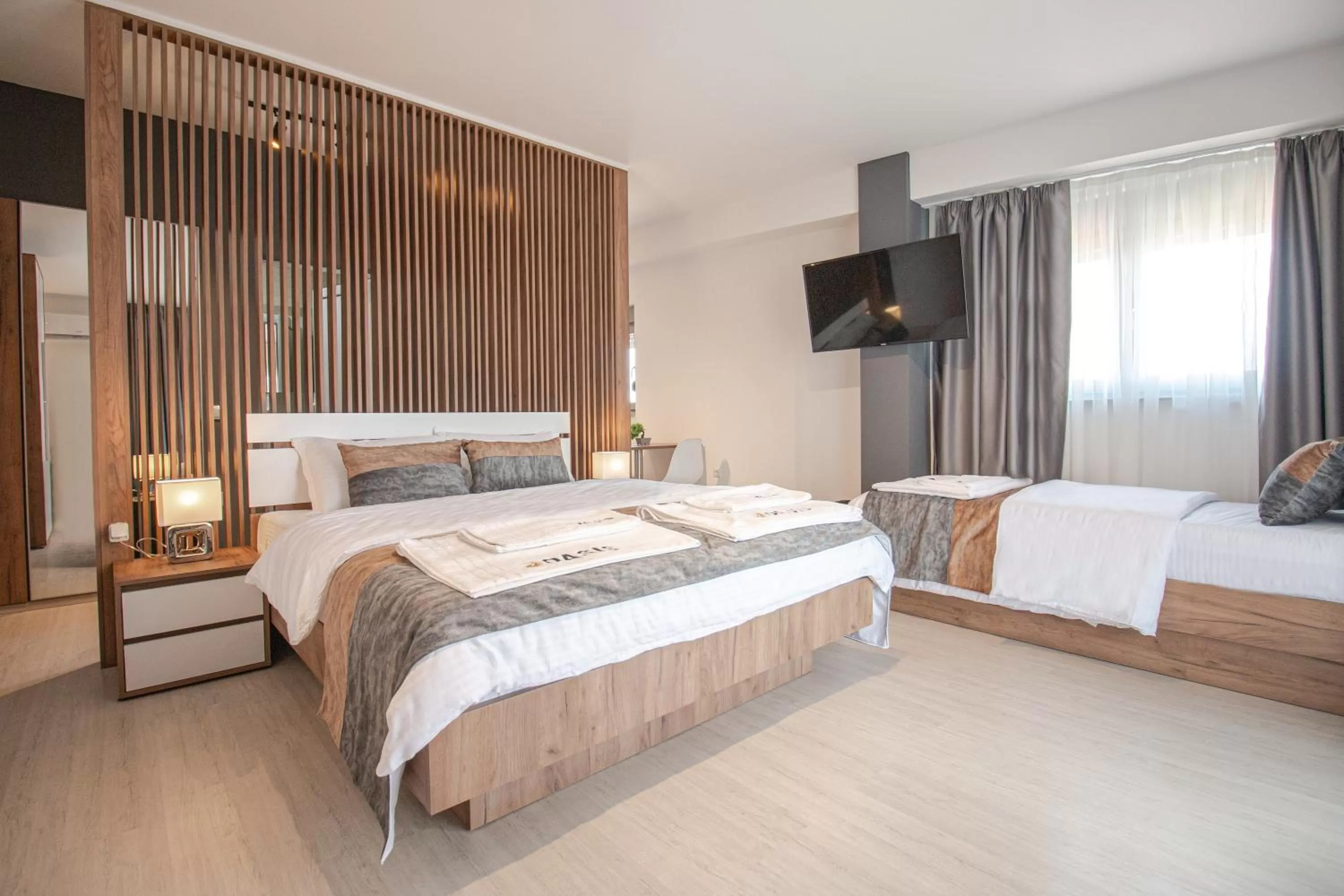 Bed in OASIS Apartments