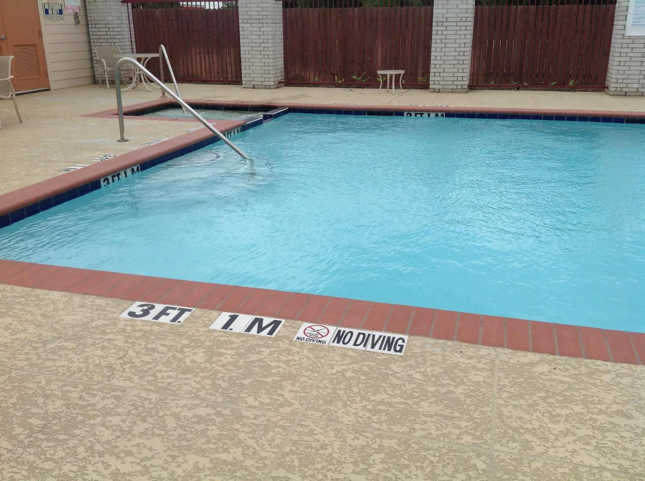 Swimming pool in Scottish Inns & Suites Timber Creek, Houston, TX