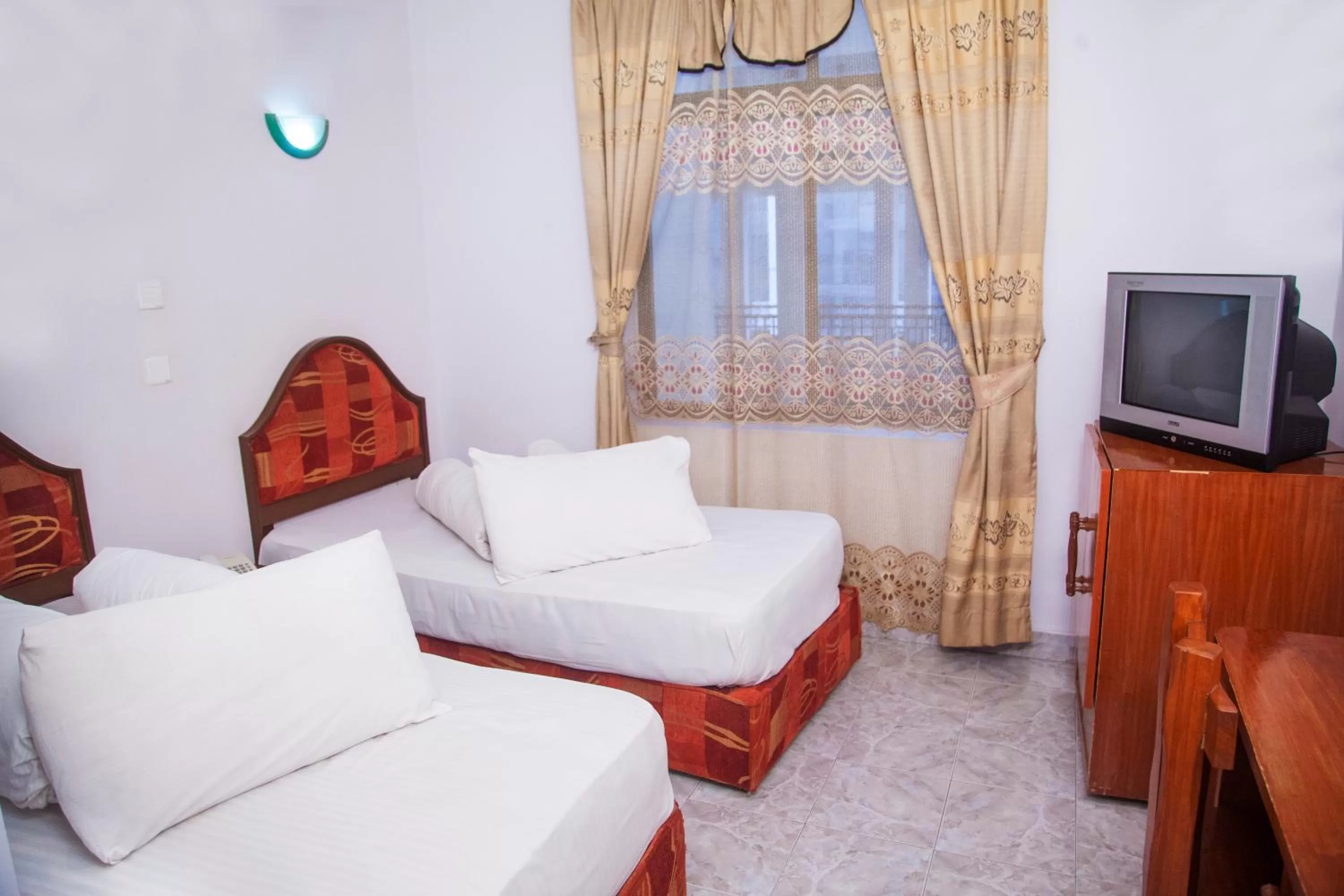 Bed in Natron Palace Hotel