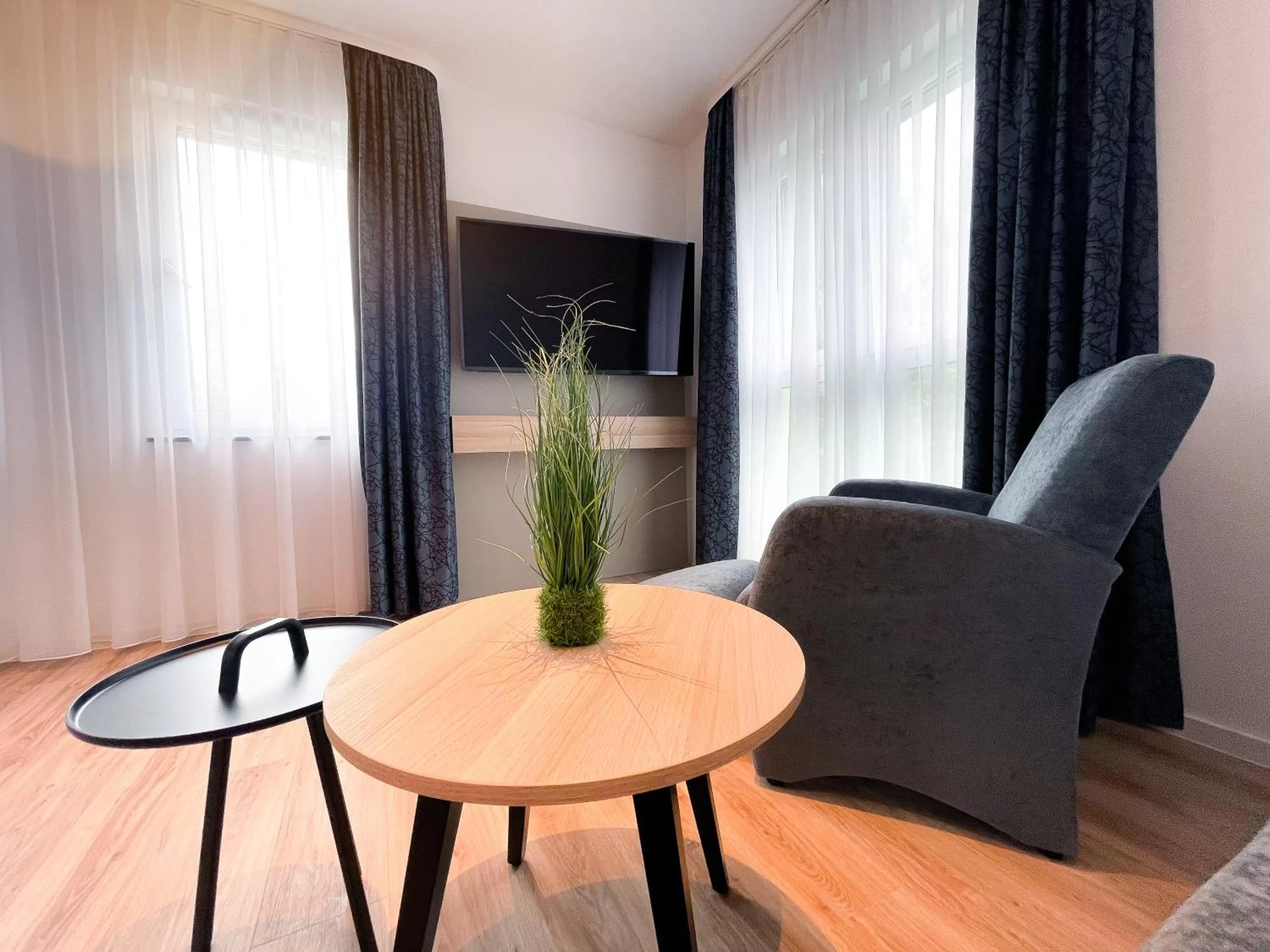 Living room in HOLI City Apart Hotel Berlin