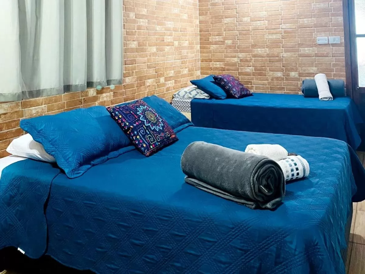 Bed in Pousada Vila de Monaco