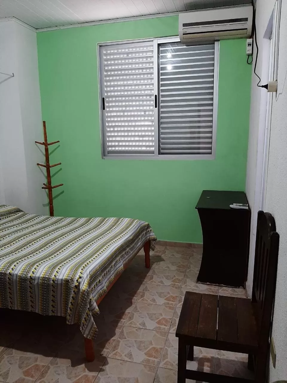 Bed in Pousada Canoas