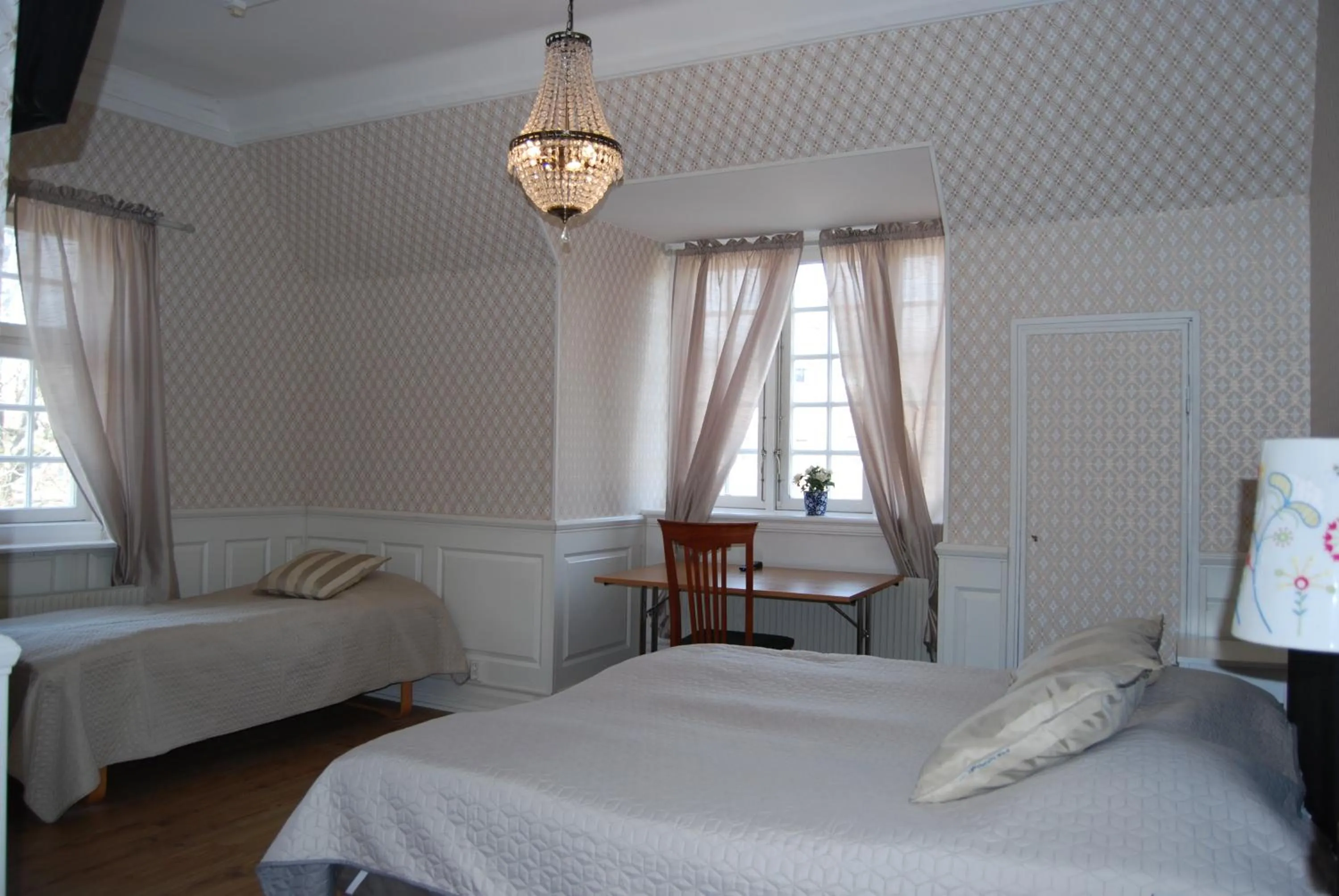 Bed in Halmstad Hotell & Vandrarhem Kaptenshamn