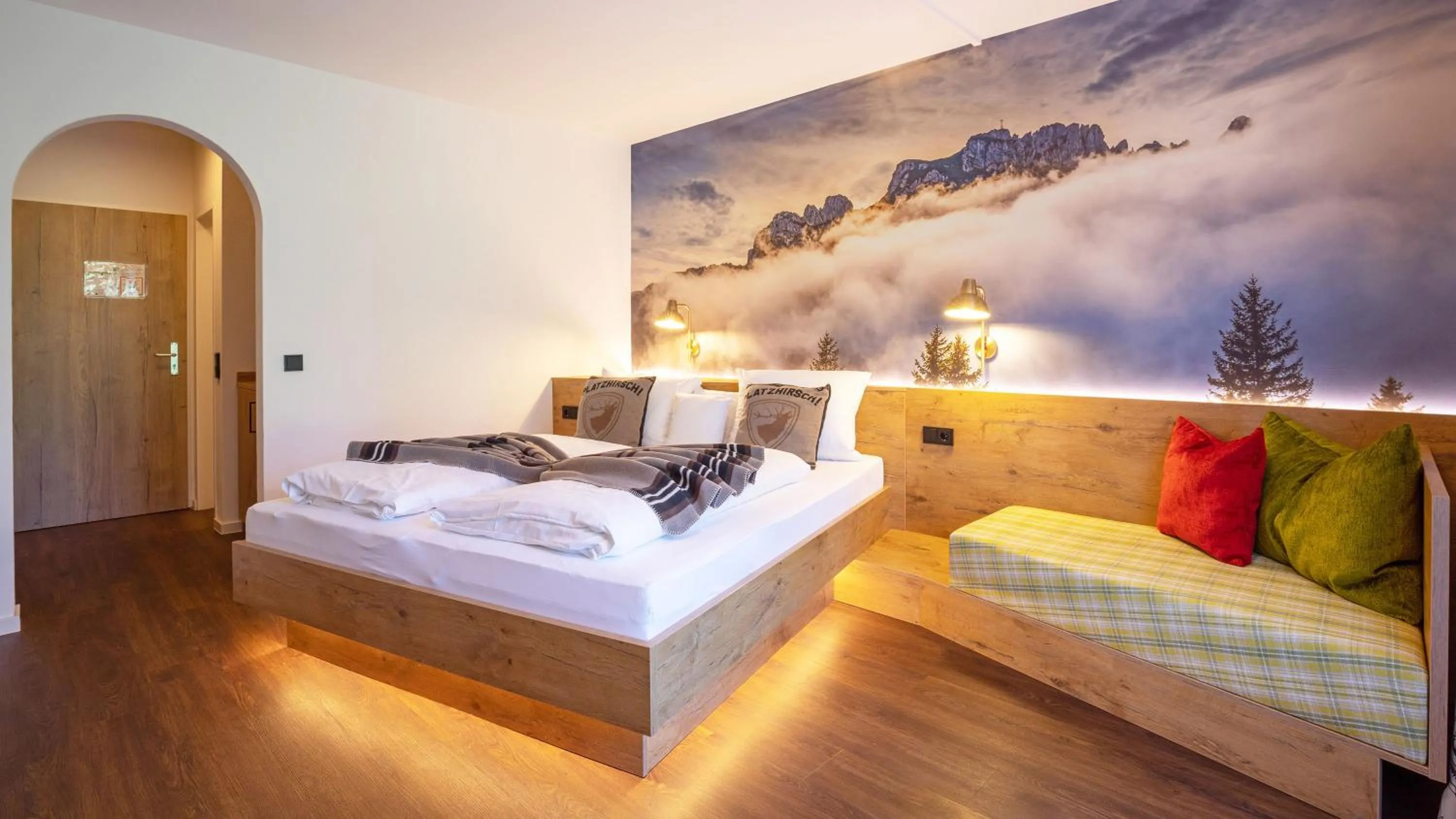 Photo of the whole room, Bed in Das Bergmayr - Chiemgauer Alpenhotel