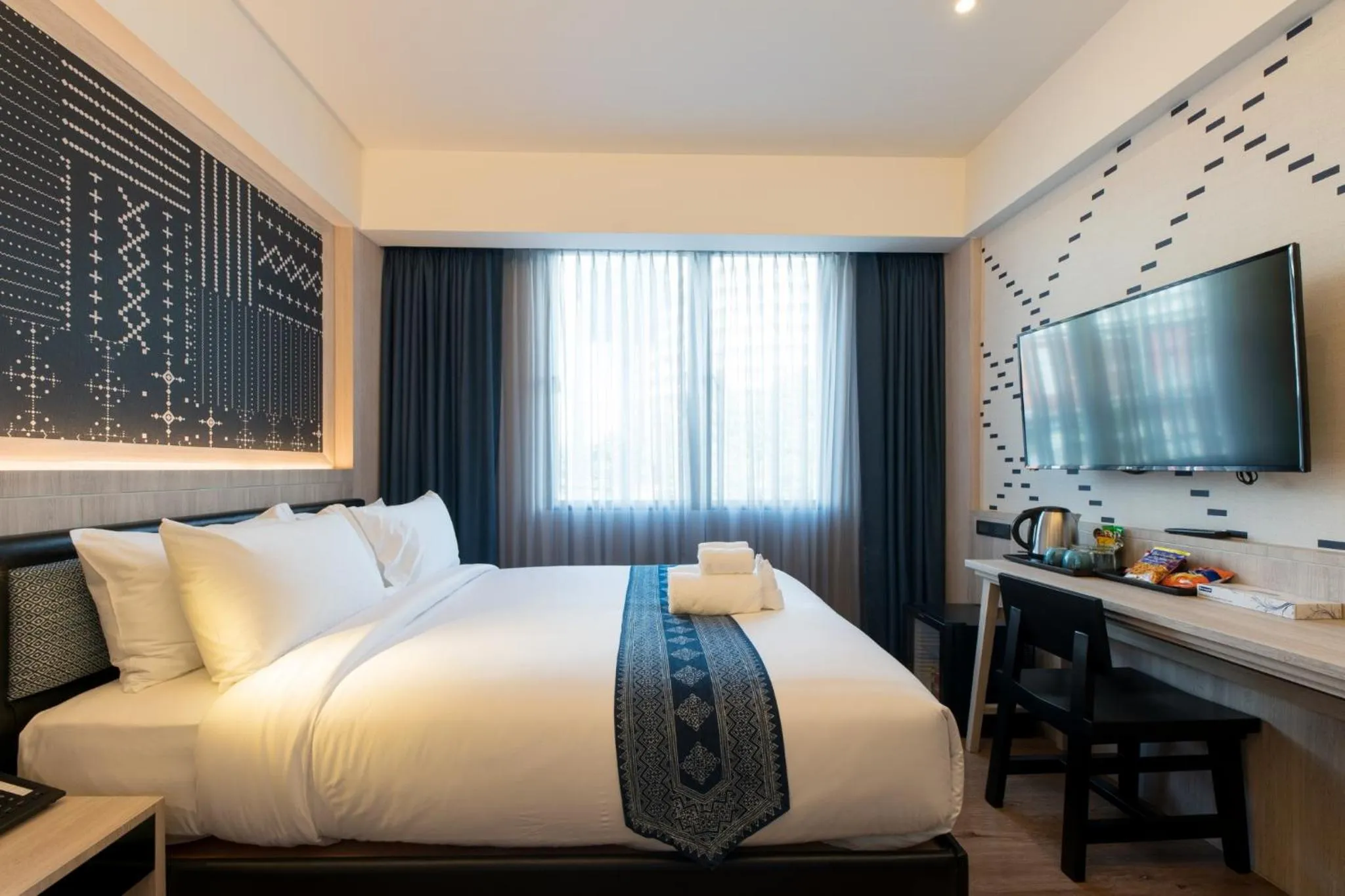 Bed in Salee Boutique Hotel