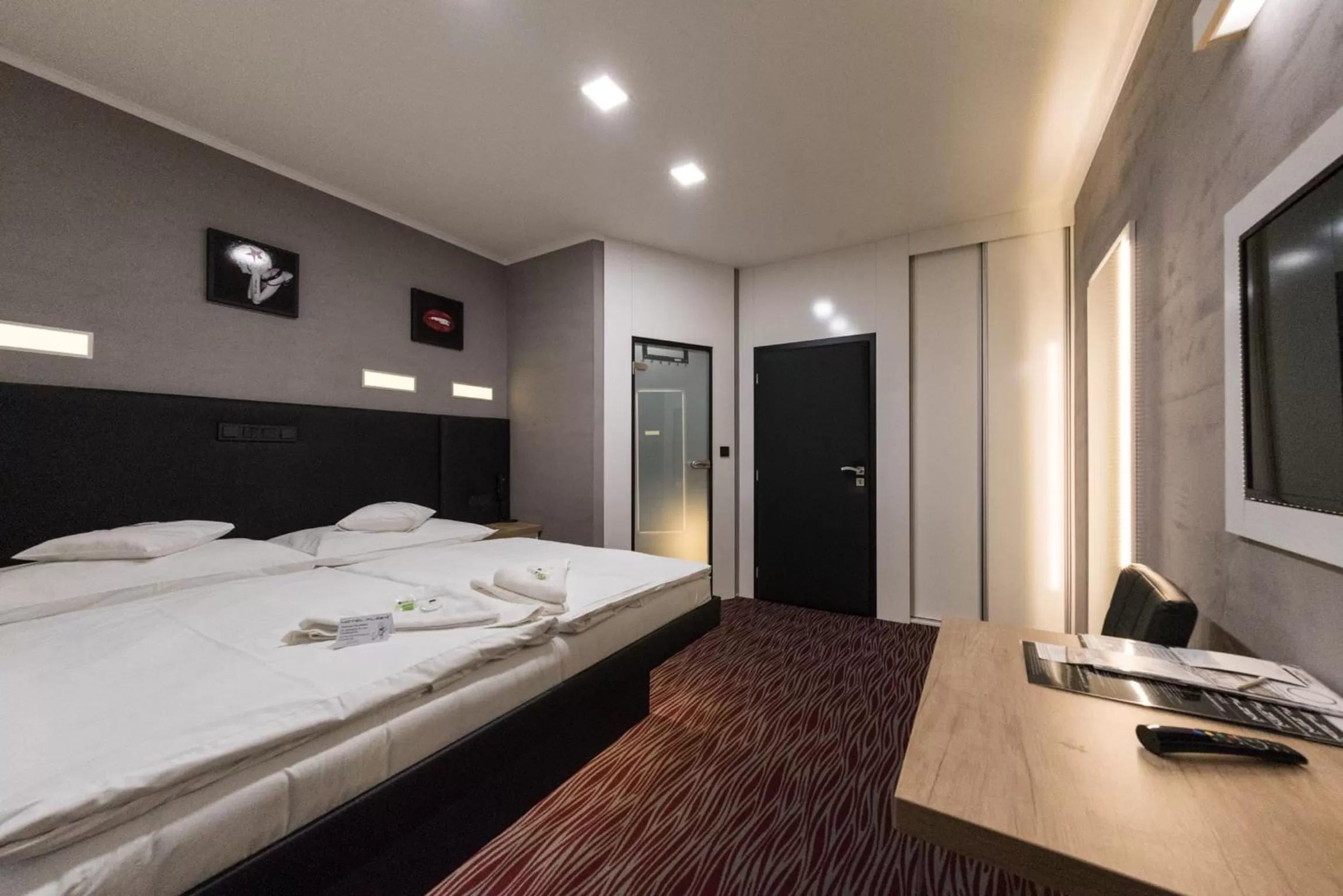 Living room, Bed in Hotel Plzeň