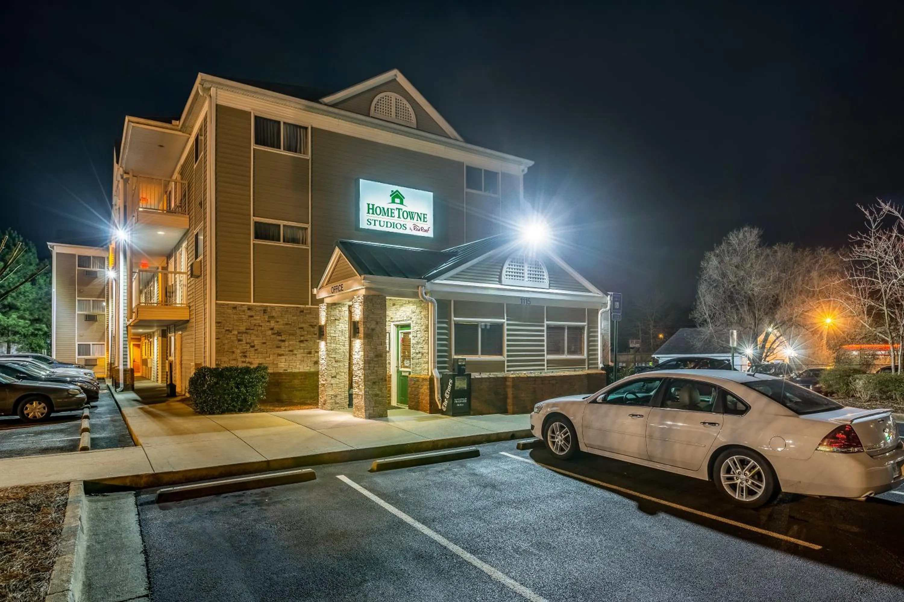 Property building in HomeTowne Studios by Red Roof Gainesville, GA